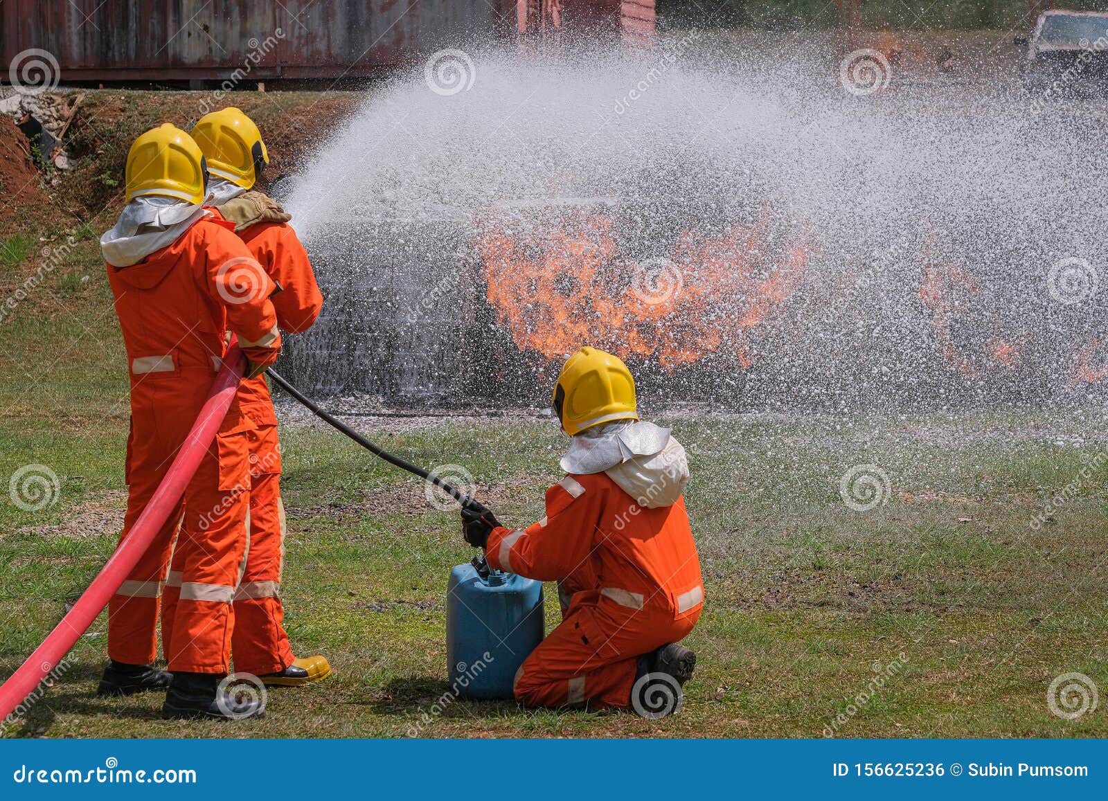 Firefighters Extinguish The Fire With A Chemical Foam Coming From The 