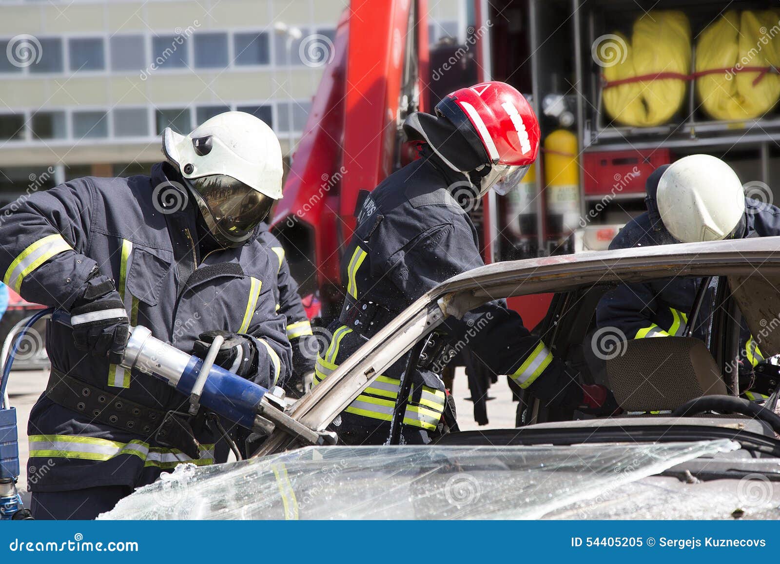 Firefighters with the Pneumatic Shears Open the Car Doors Stock Image