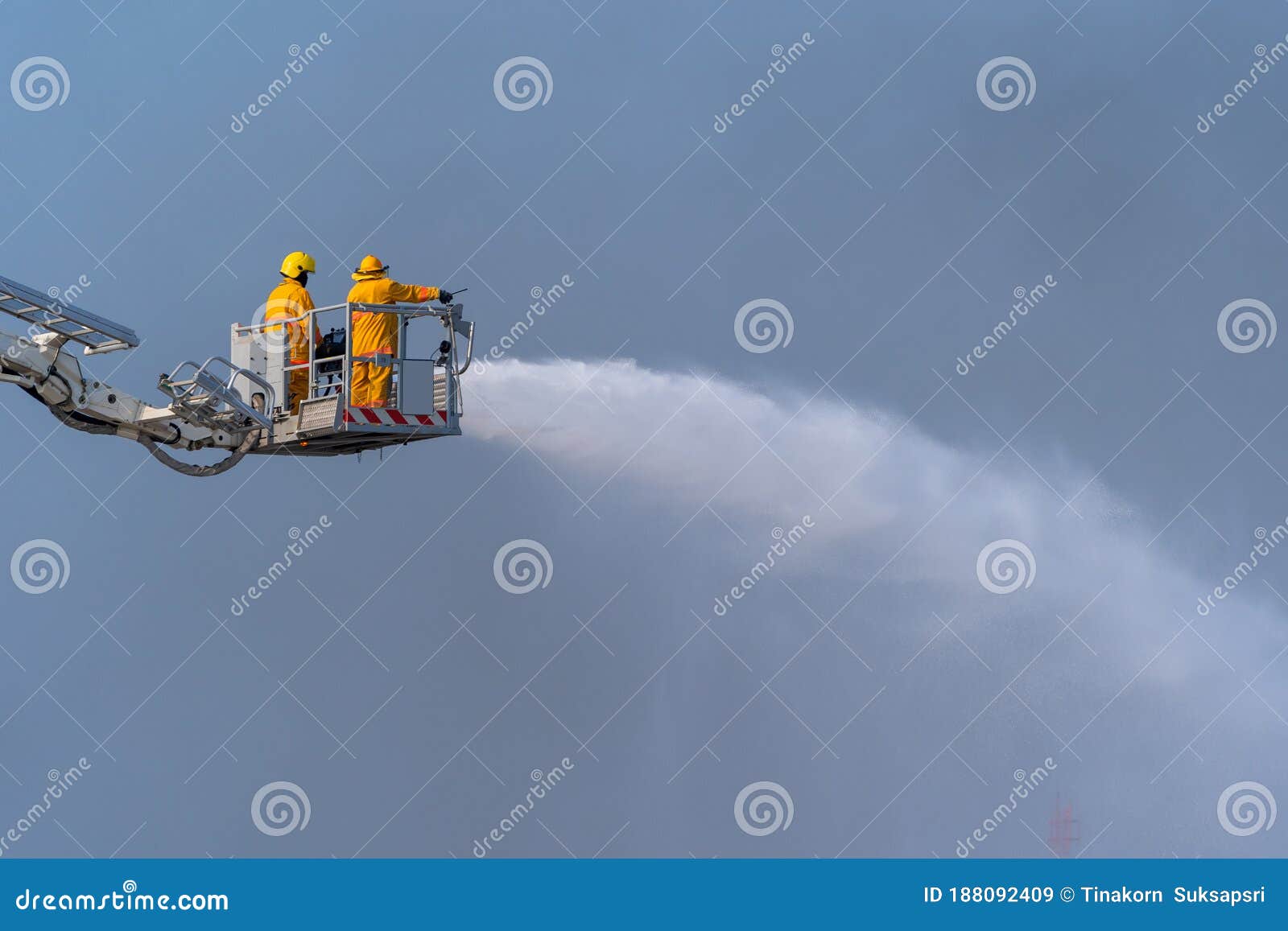 Fireman Extinguishes Spraying Water for Firefighting from the Cable Car