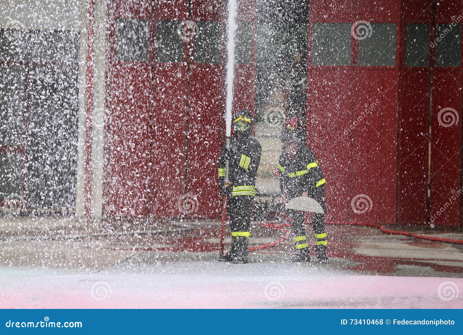 Fireman during the Fire Drill with the Hose Stock Photo Image of fire