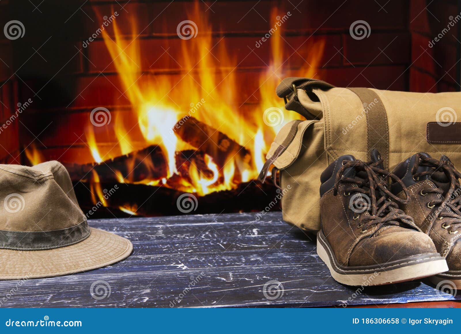 Fireplace boots and hat stock photo. Image of home, shoes 186306658