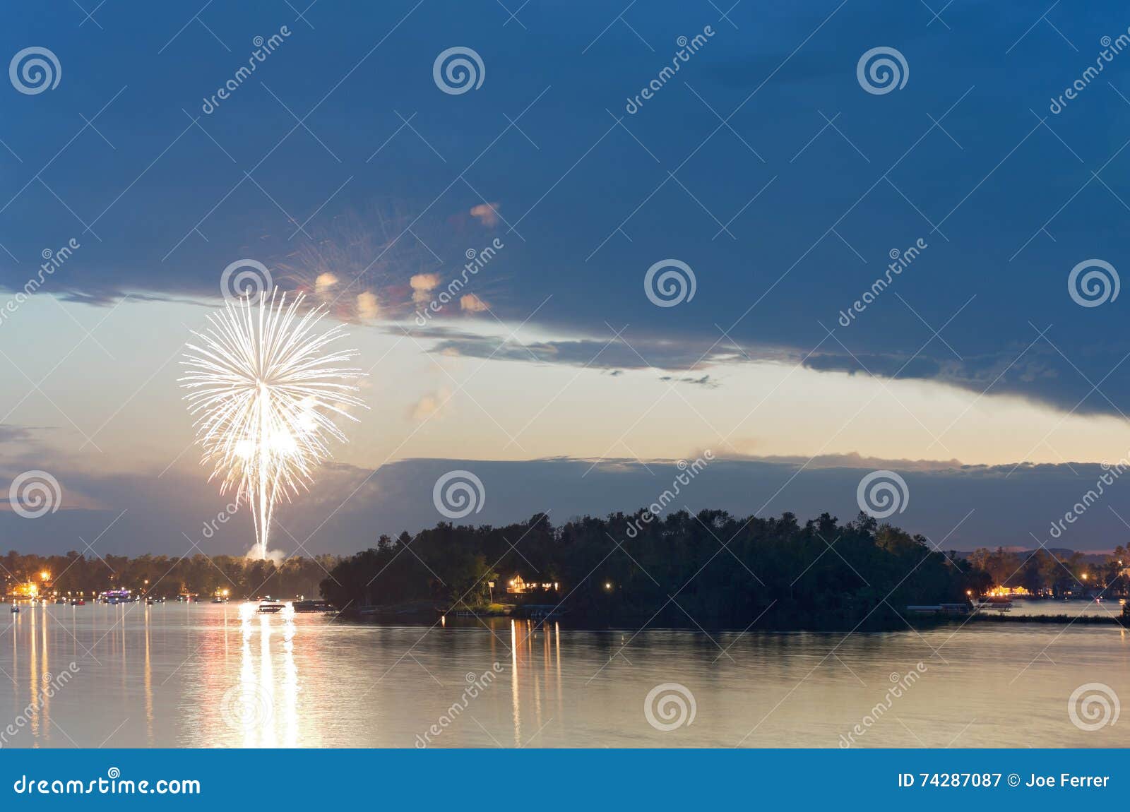 Fireworks at Dusk Over Gull Lake Stock Image Image of pyrotechnics