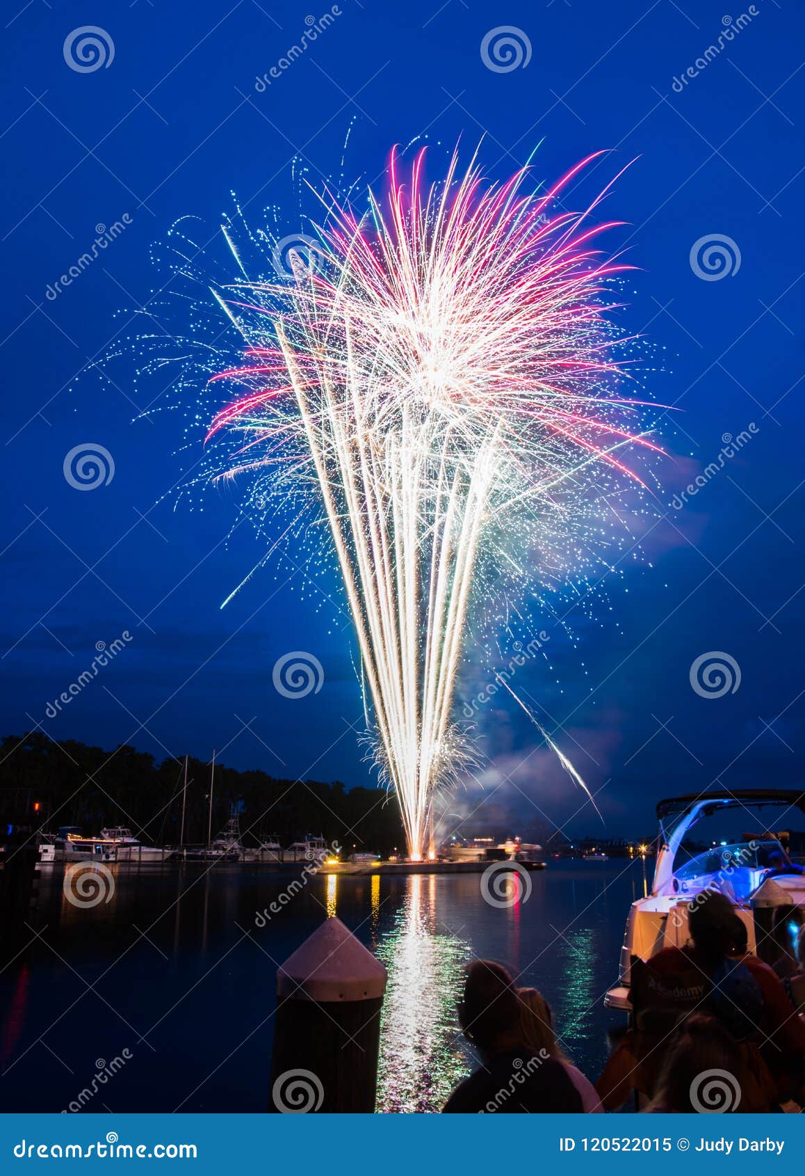 fireworks launched over the tchefuncte river in madisonville, louisiana