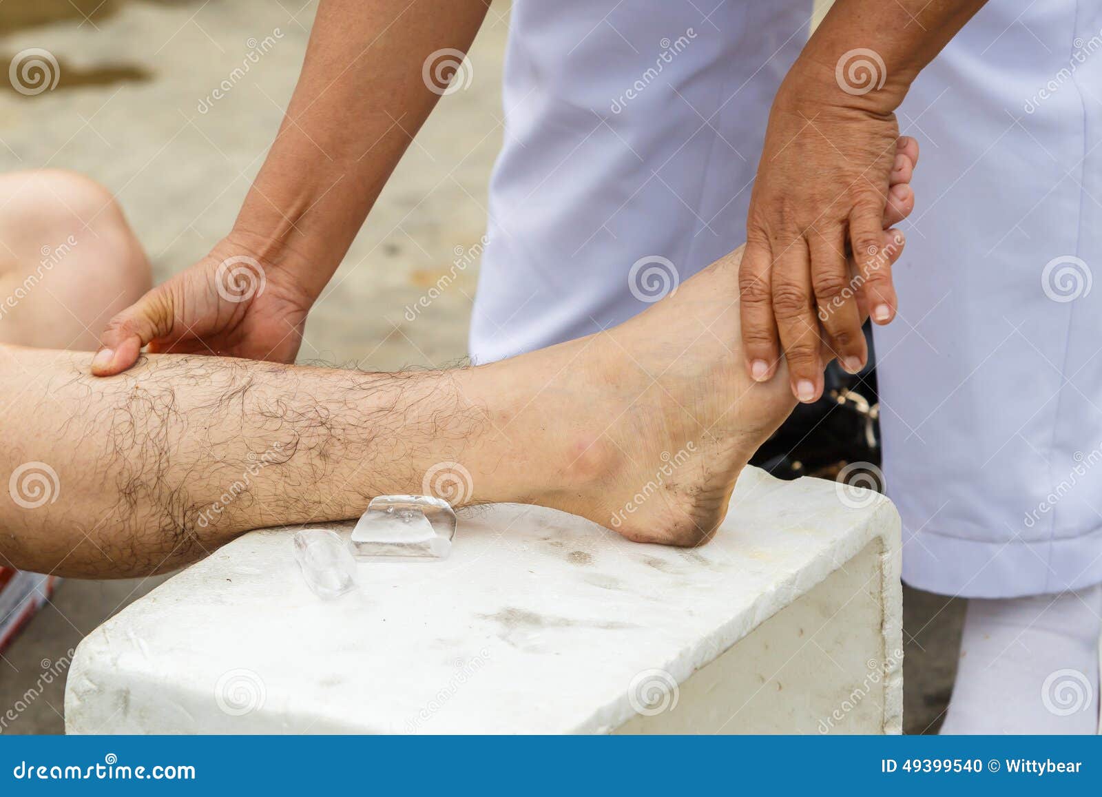 First aid for cramp injury stock photo. Image of muscle 49399540