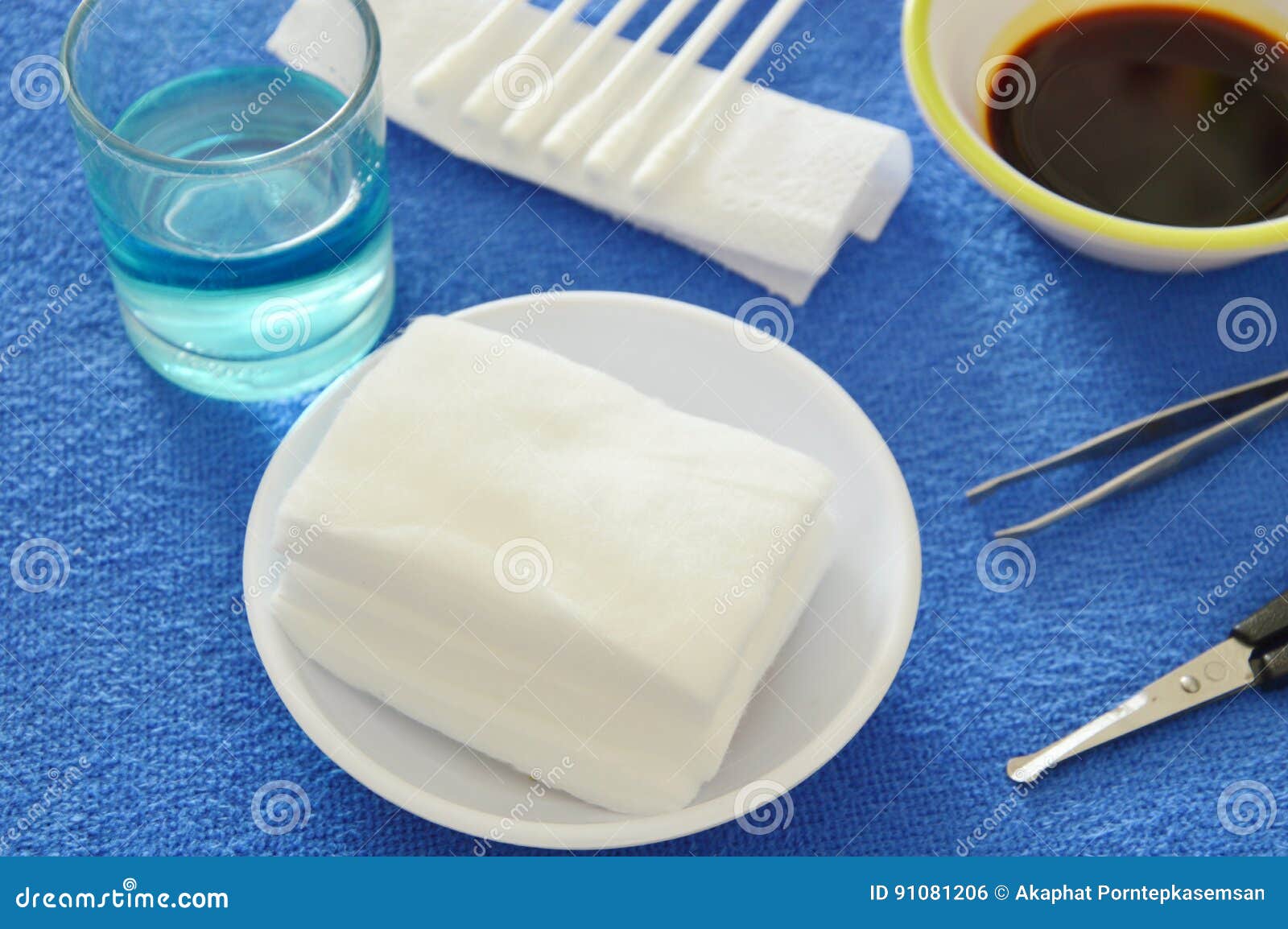 First Aid Kits for Basic Cleaning Injury Wound on Blue Desk Stock Photo