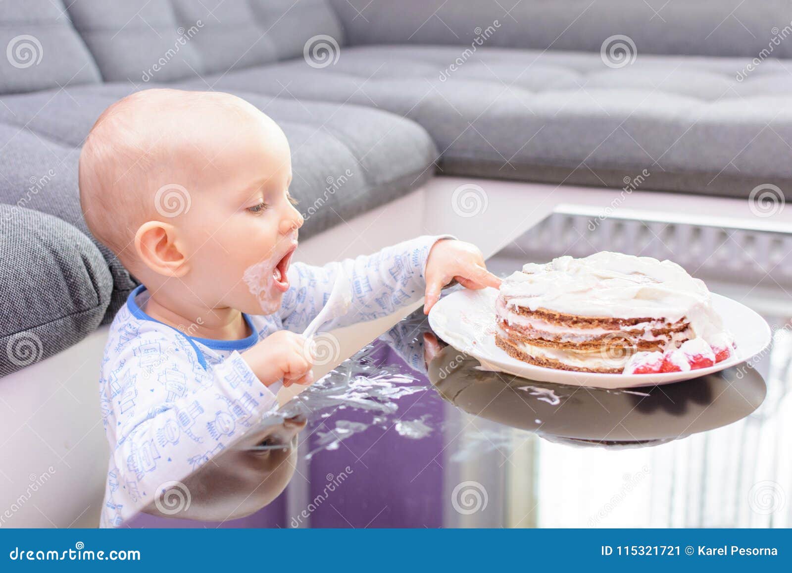 Little Boy Eating Birthday Cake With A Spoon Happy Birthday Stock