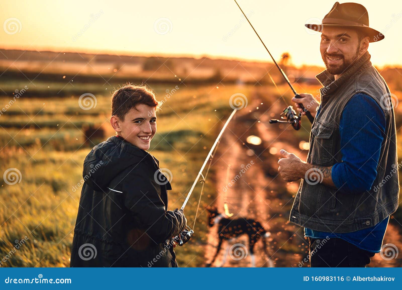 The First Joint Fishing of Adult Father and Teen Son in Warm, Sunny Day.  Stock Photo - Image of lifestyle, child: 160983116