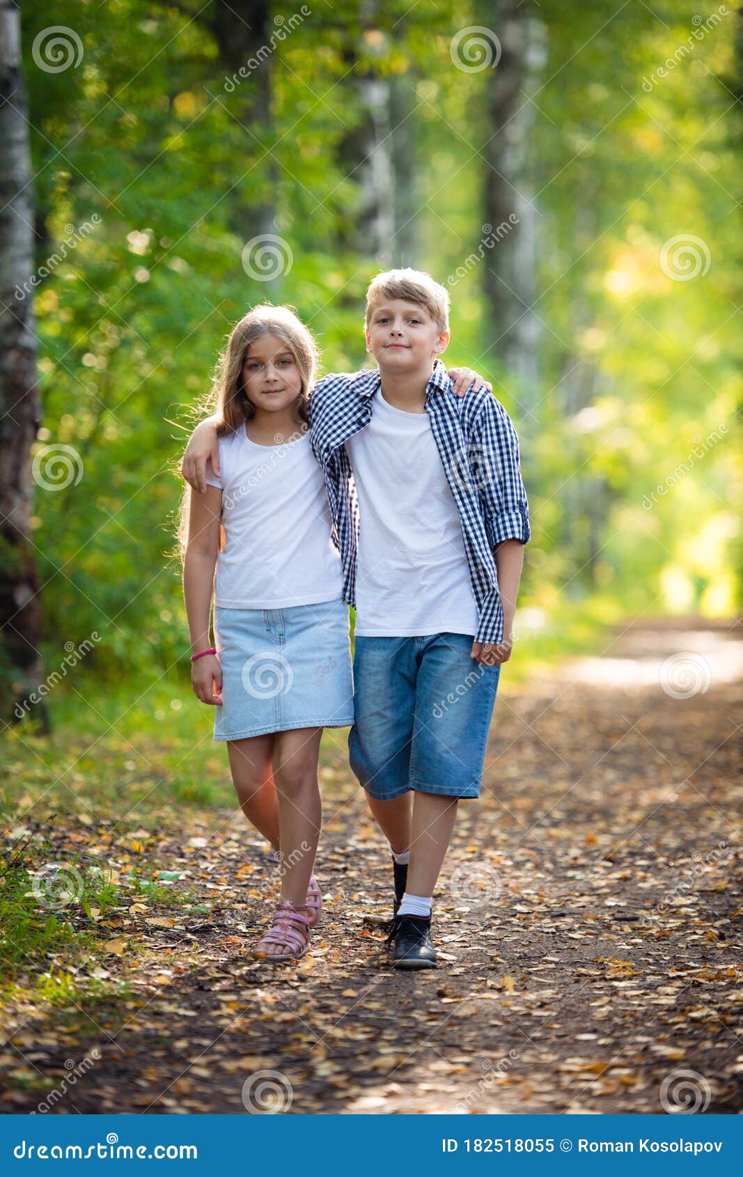 First Love Little Boy And Girl Holding Hands And Smiling While Walking Outdoors In Park Stock Image Image Of Grass Female