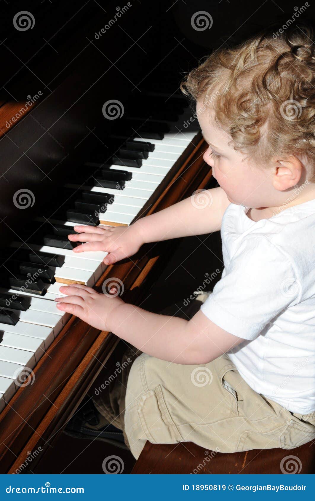 First piano lesson stock image. Image of toddler, music 18950819
