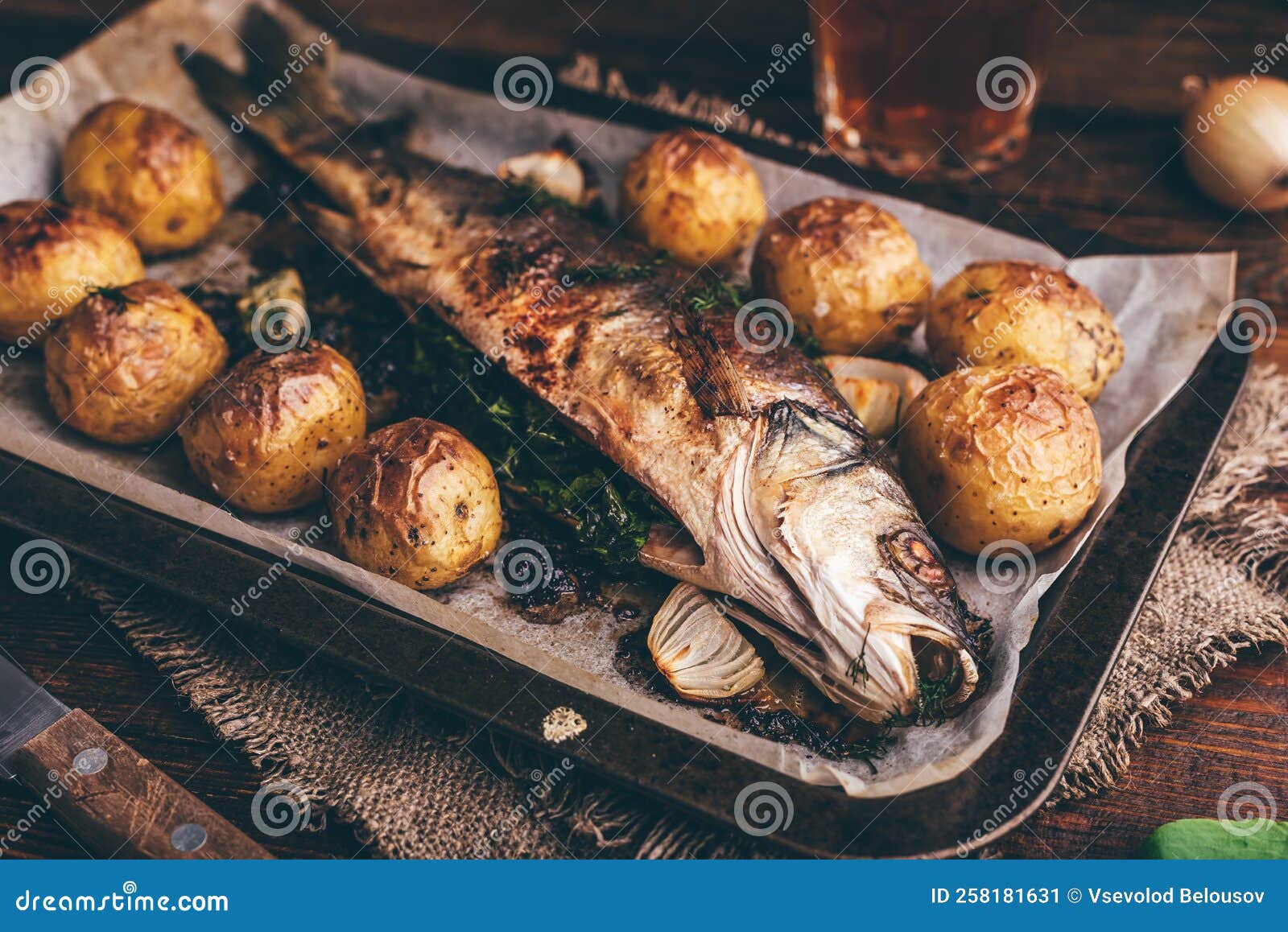 Fish Baked with Sorrel and New Potatoes Stock Image - Image of cuisine