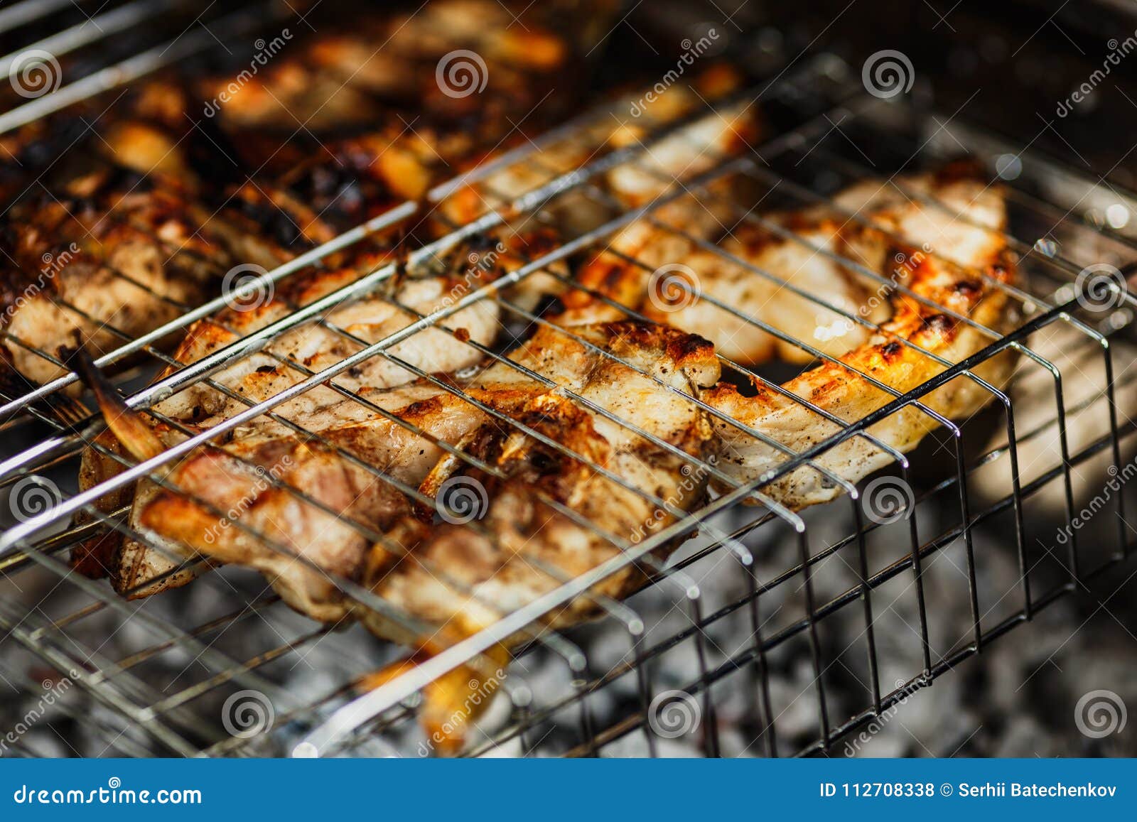Fish Barbecue, the Process of Cooking Fish on the Grill Stock Photo