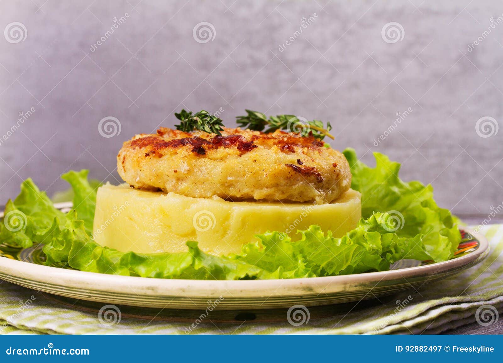 Fish Cake with Mashed Potato and Lettuce. Stock Image Image of