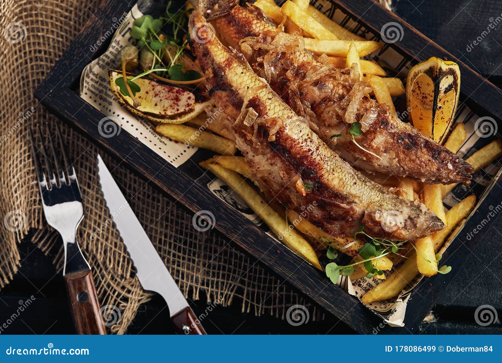 Fish And Chips Classic English Food French Fries And Fried Fish On A Wooden Board Dark Wooden Background Food Photo Stock Image Image Of Cooked British 178086499