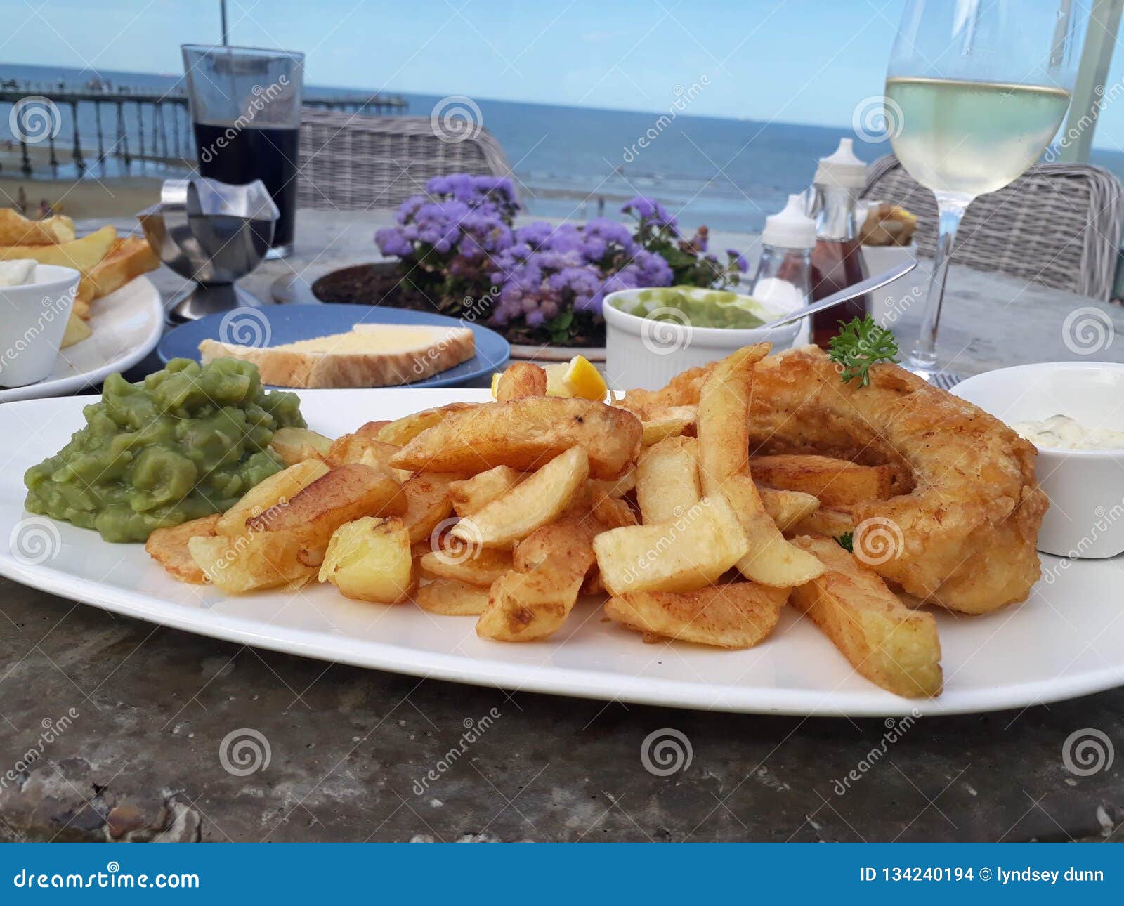 Fish and chips by the sea stock photo. Image of fish 134240194