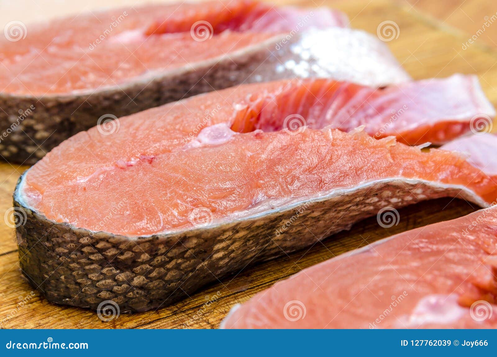Fish Chum Salmon on a Cutting Board and a Steak of Red Fish Stock Image -  Image of fish, marine: 127762039
