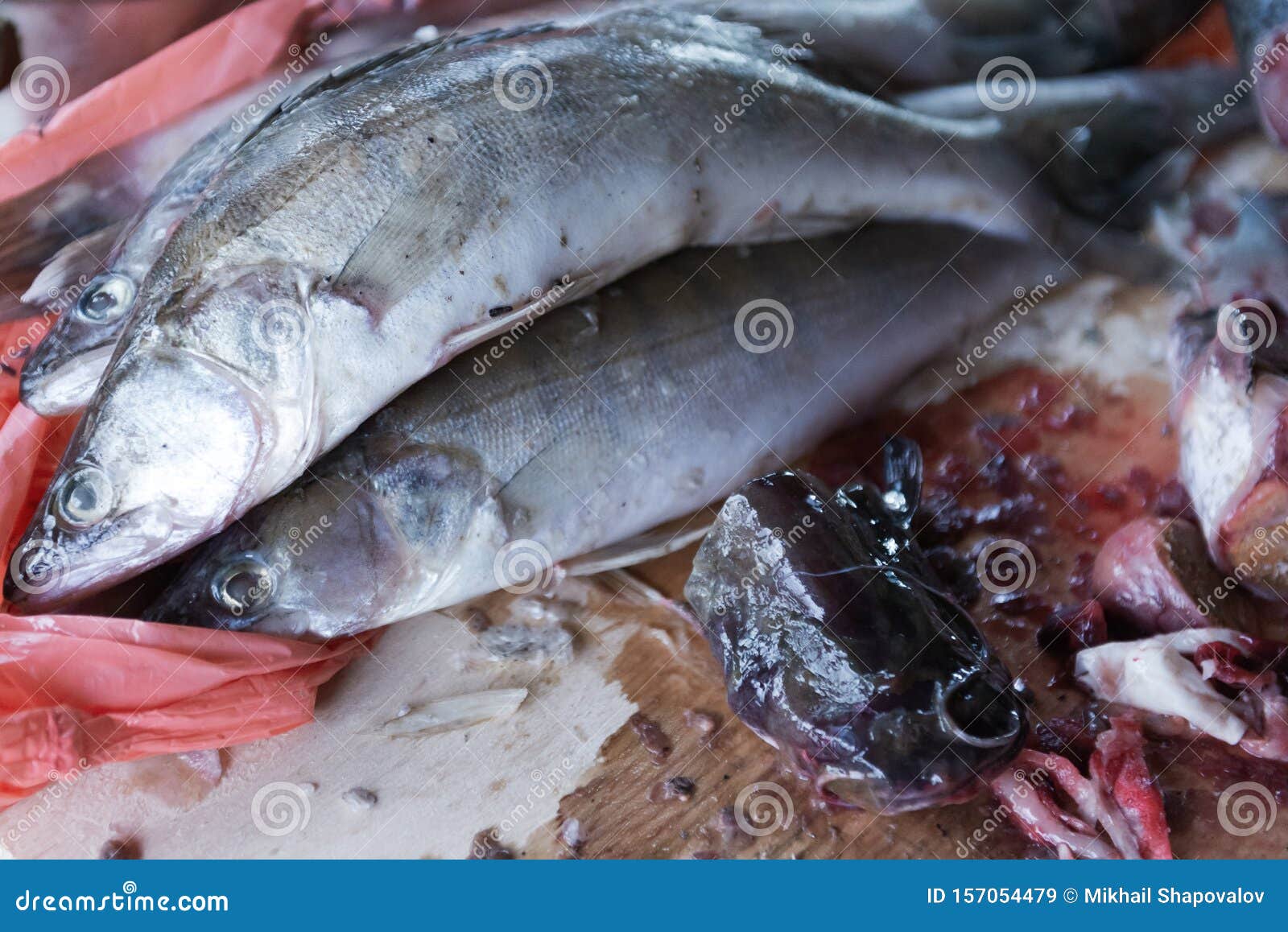 Fish on the cutting table stock image. Image of prepared 157054479