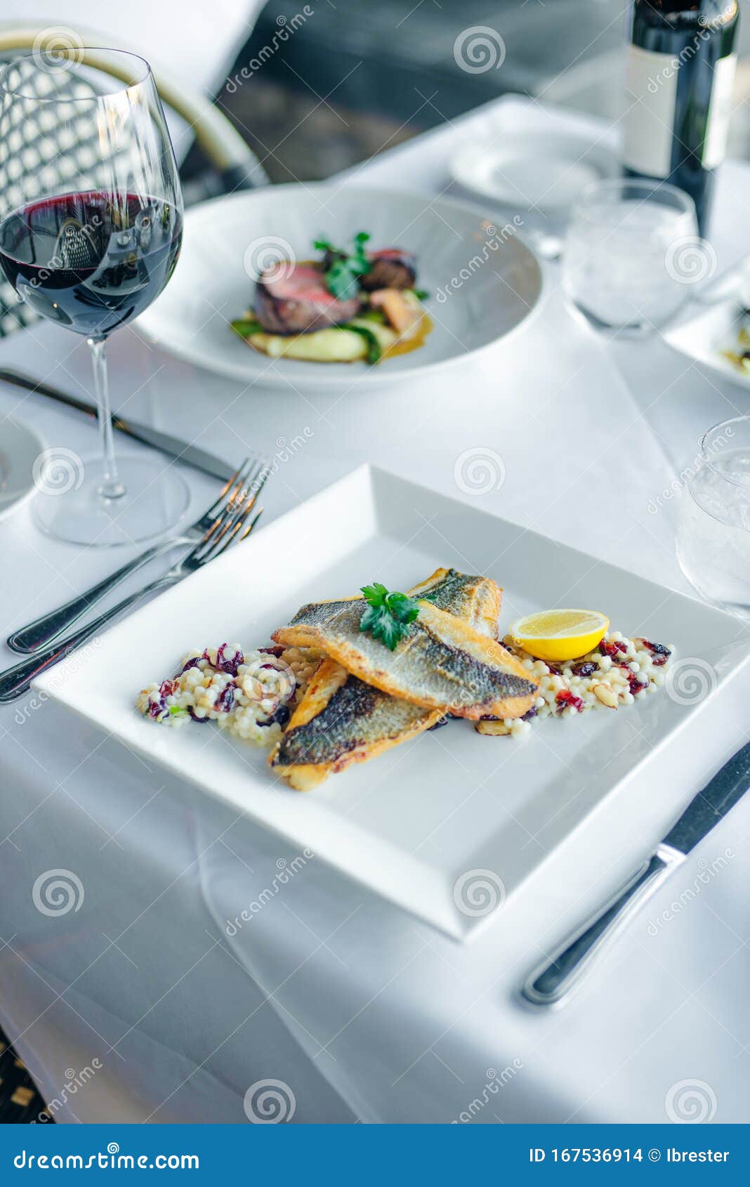 fish dish - fish fillet and vegetables in restaurante