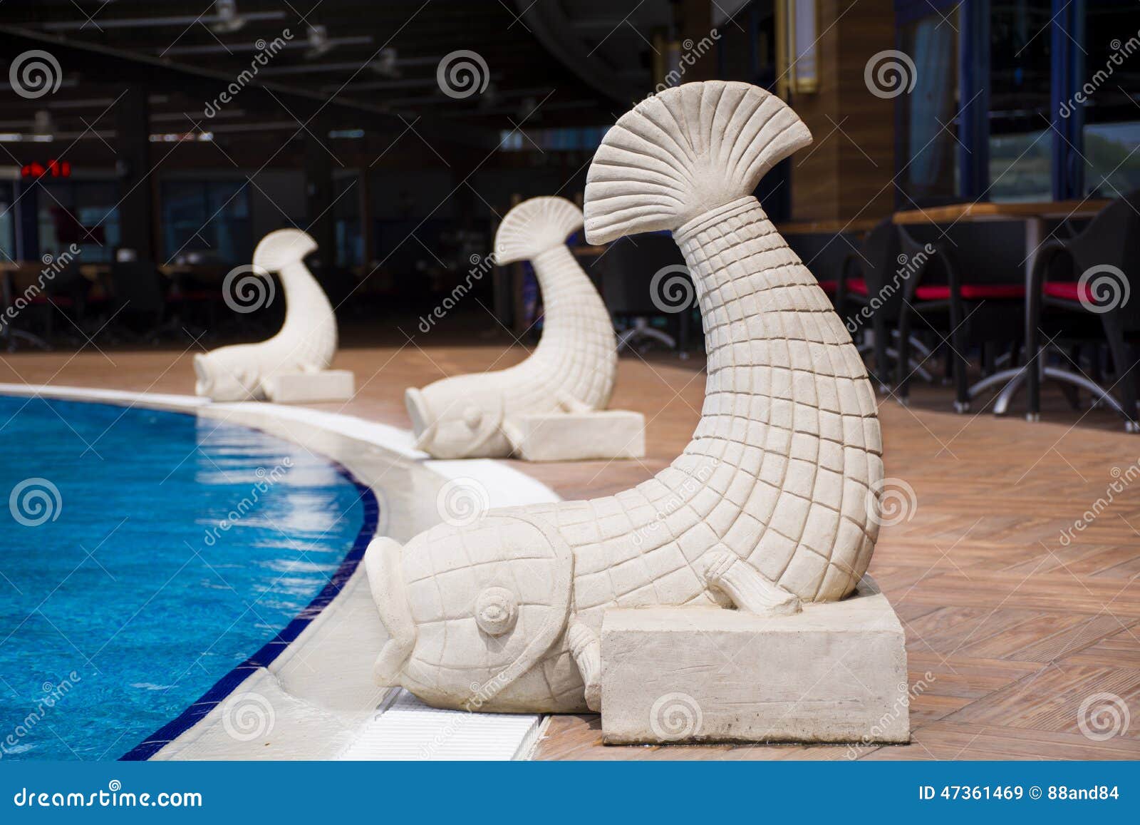 Fish fountain on a pool stock image. Image of beautiful 47361469