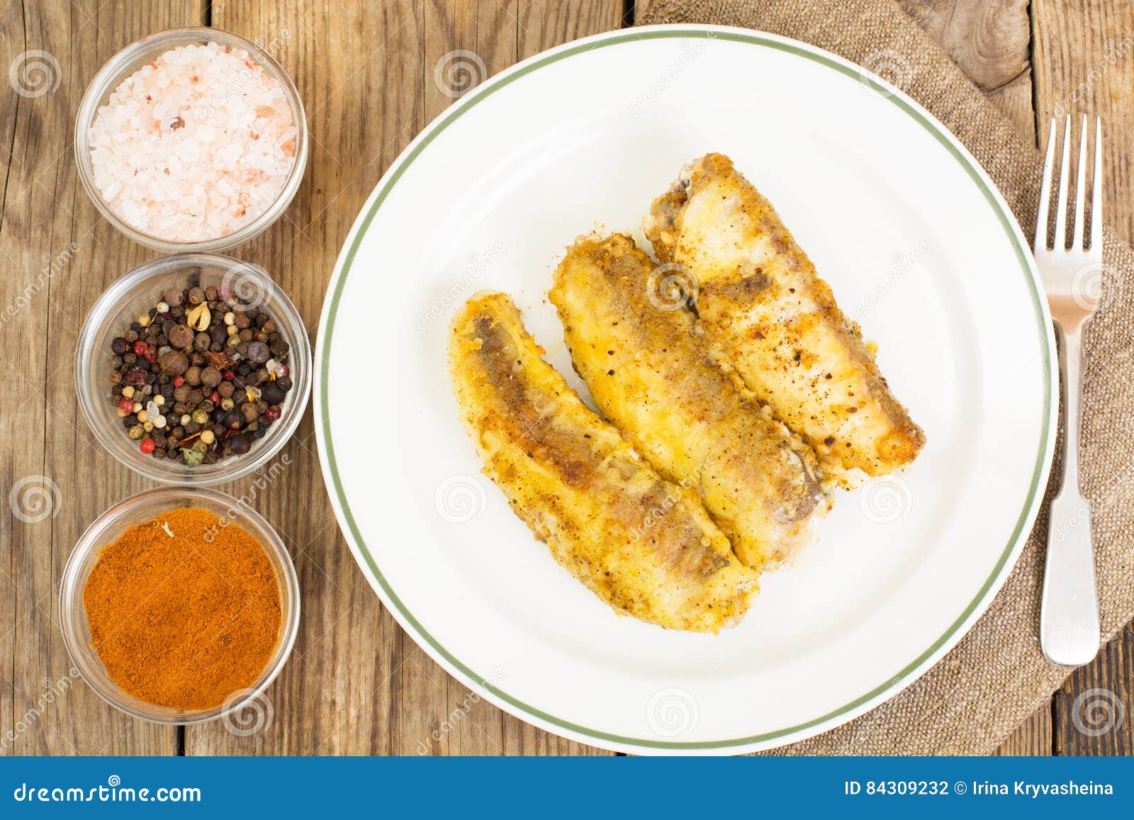 Fish fried in breadcrumbs stock photo. Image of chips 84309232