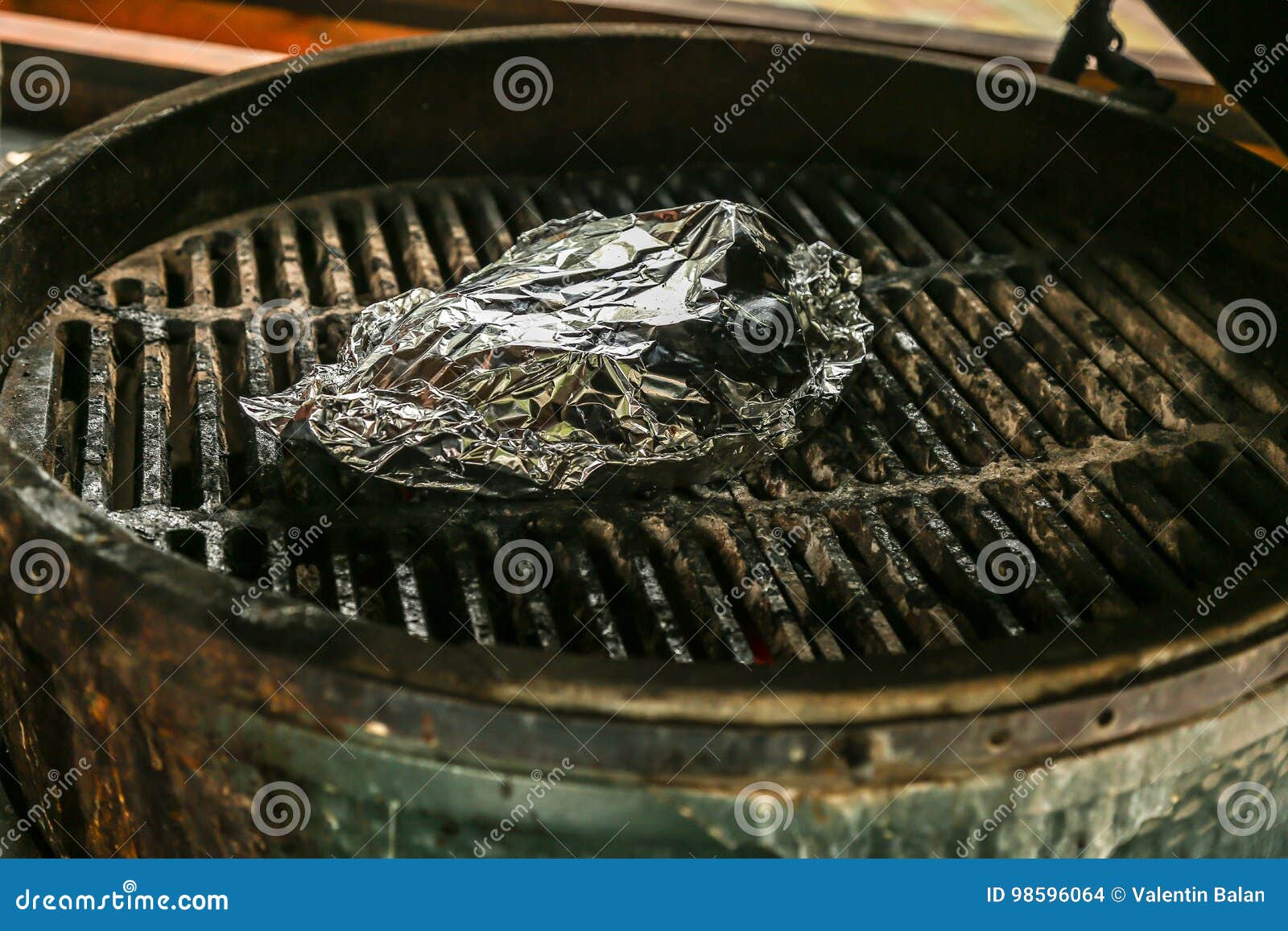 Fish on grill stock photo. Image of onion, lunch, cooking 98596064