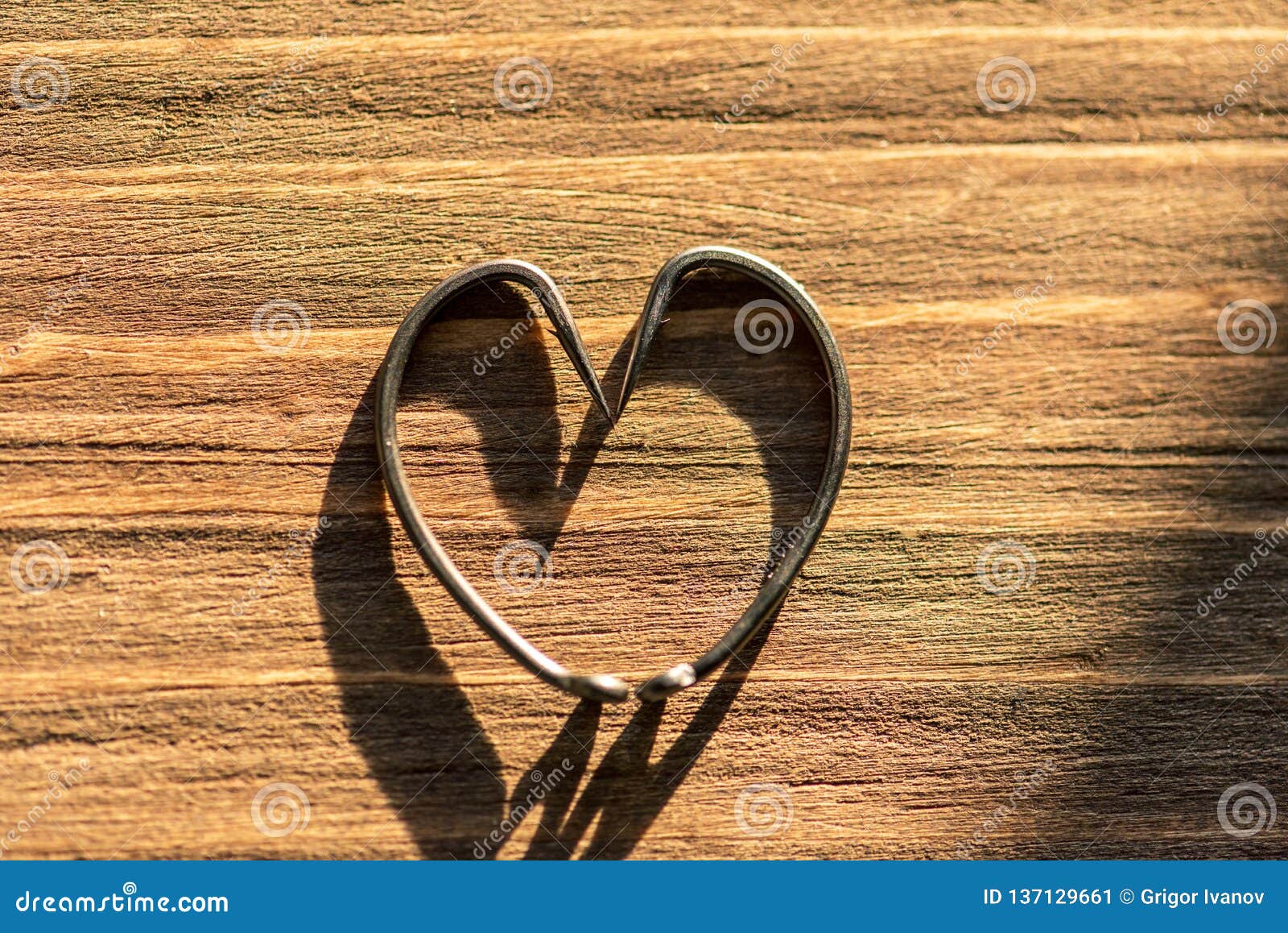 Fish hook heart stock image. Image of lure, background 137129661