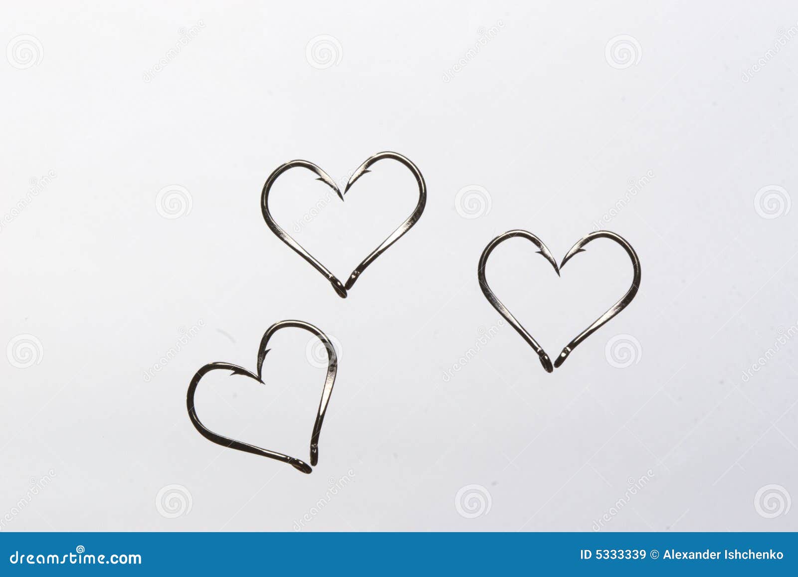 Fish hook hearts stock image. Image of concepts, hand 5333339