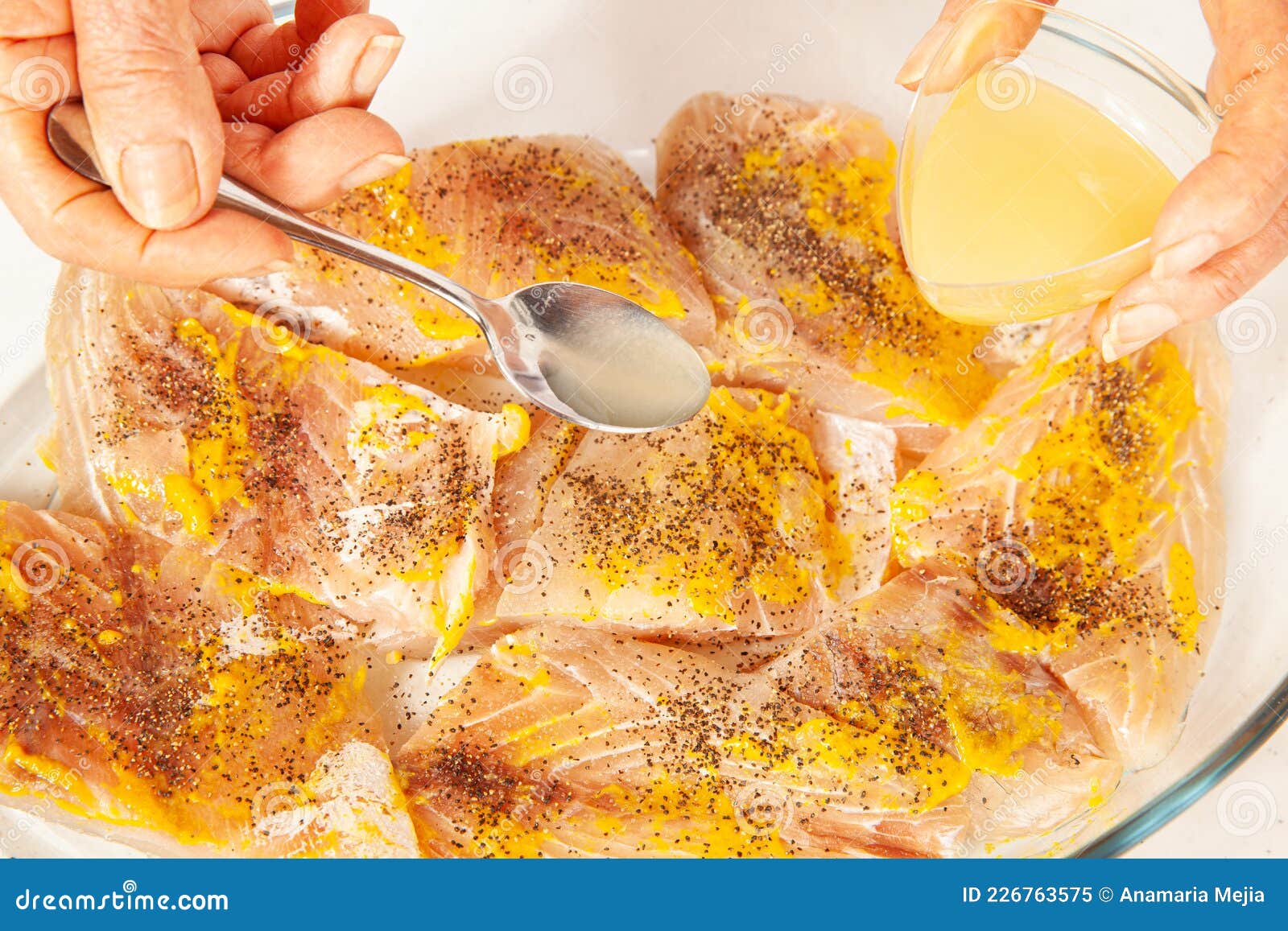 Fish Marinade Preparation Steps Adding Lemon Juice To the Fish Fillet