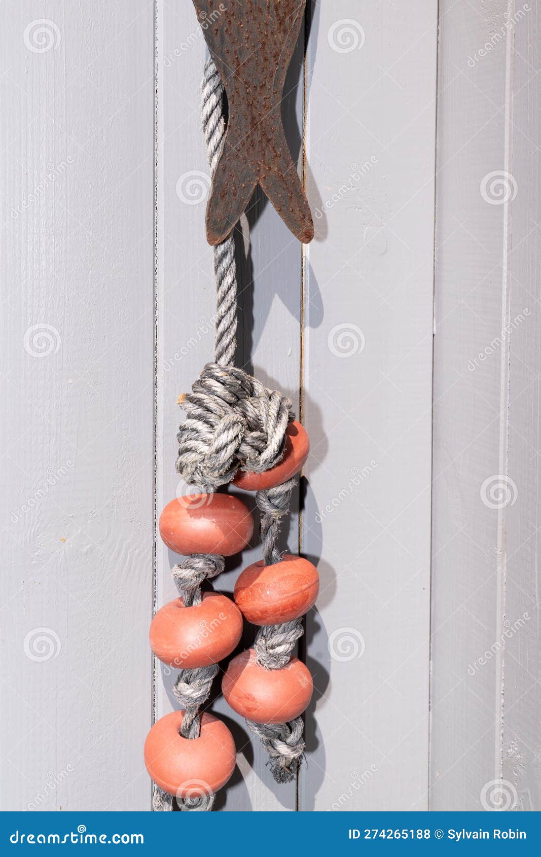 Fish Net Floats Attached To a Fence with Marine Rope As a Home Interior  Wall Decoration Stock Photo - Image of nautical, buoy: 274265188