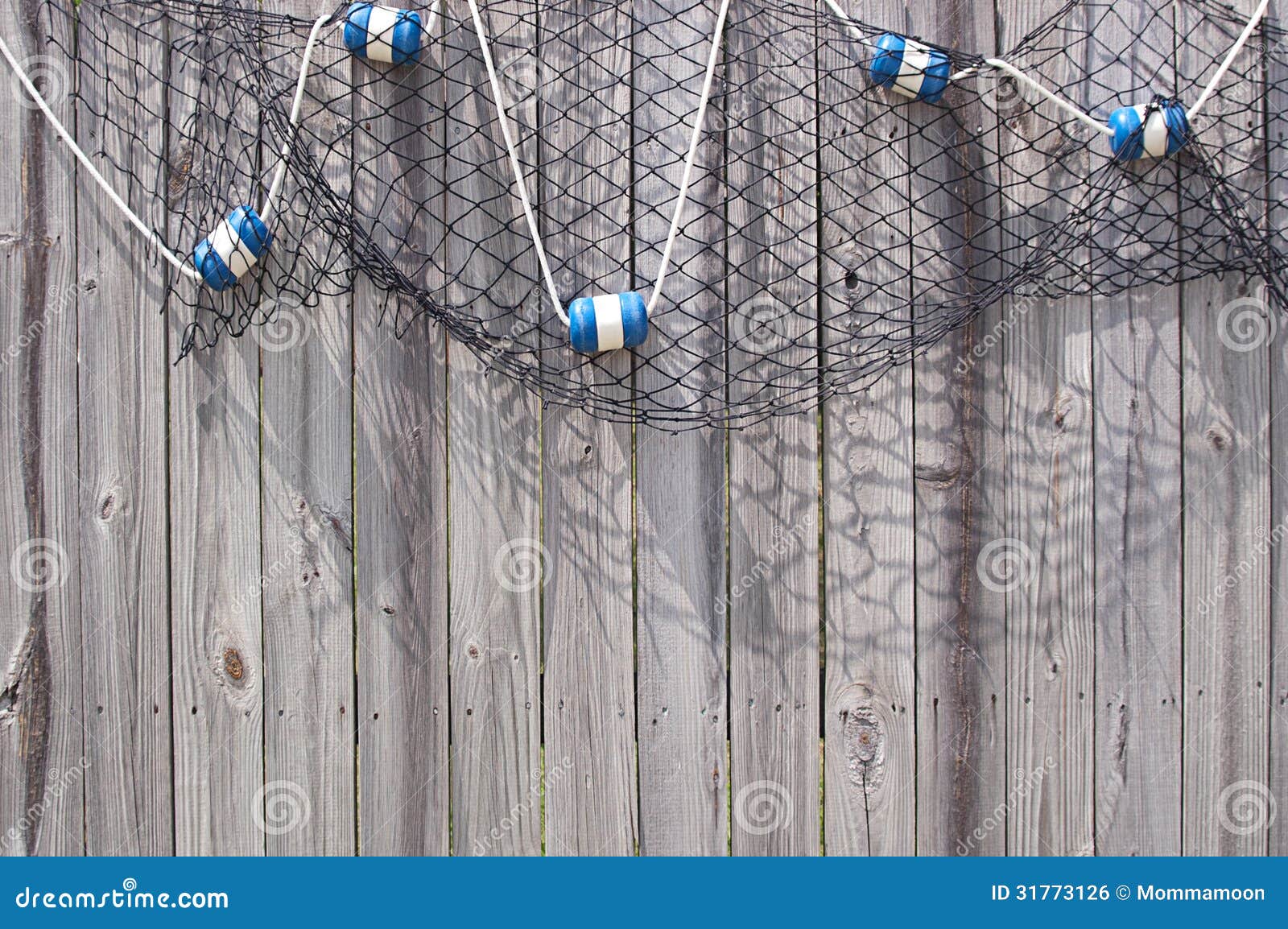 https://thumbs.dreamstime.com/z/fish-net-floats-wooden-fence-blue-white-hanging-31773126.jpg
