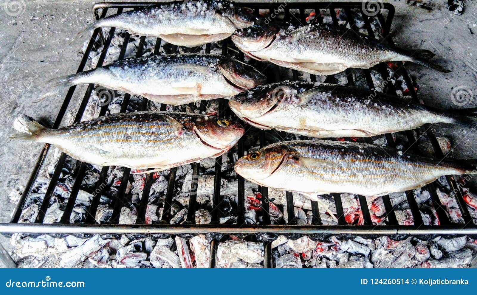 fish roasting on fire