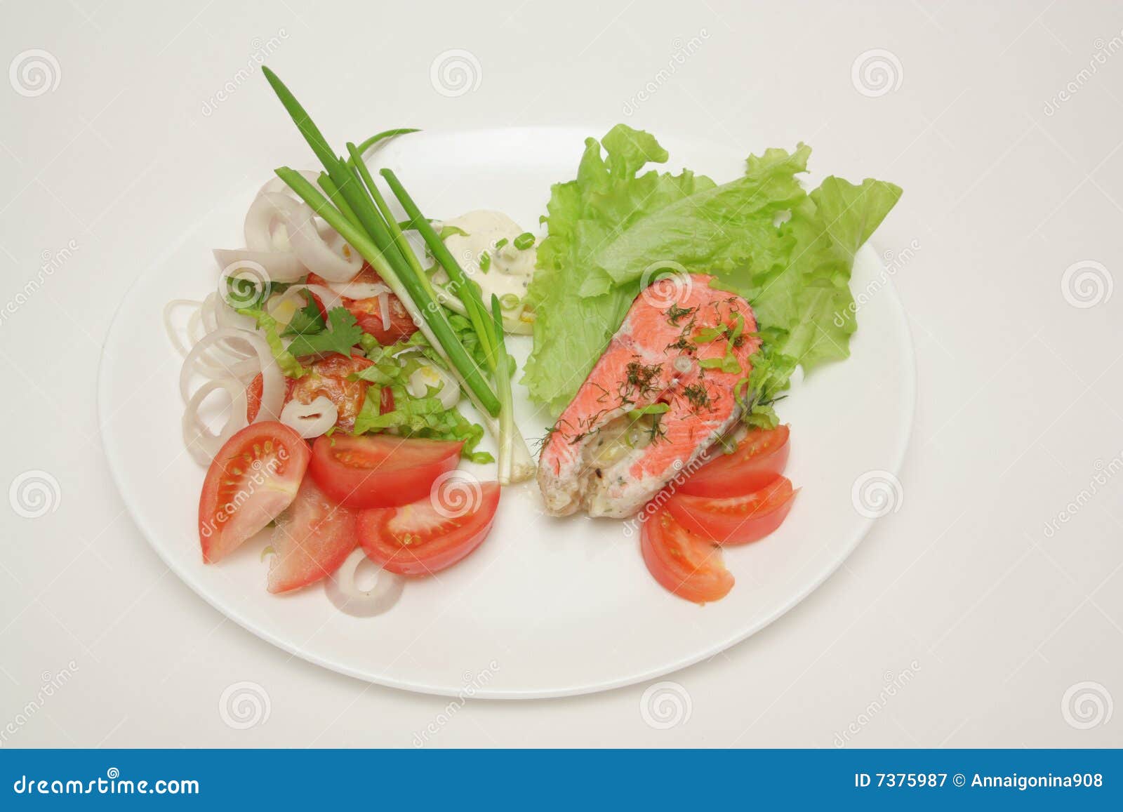 Fish with sauce and salad stock image. Image of cream 7375987