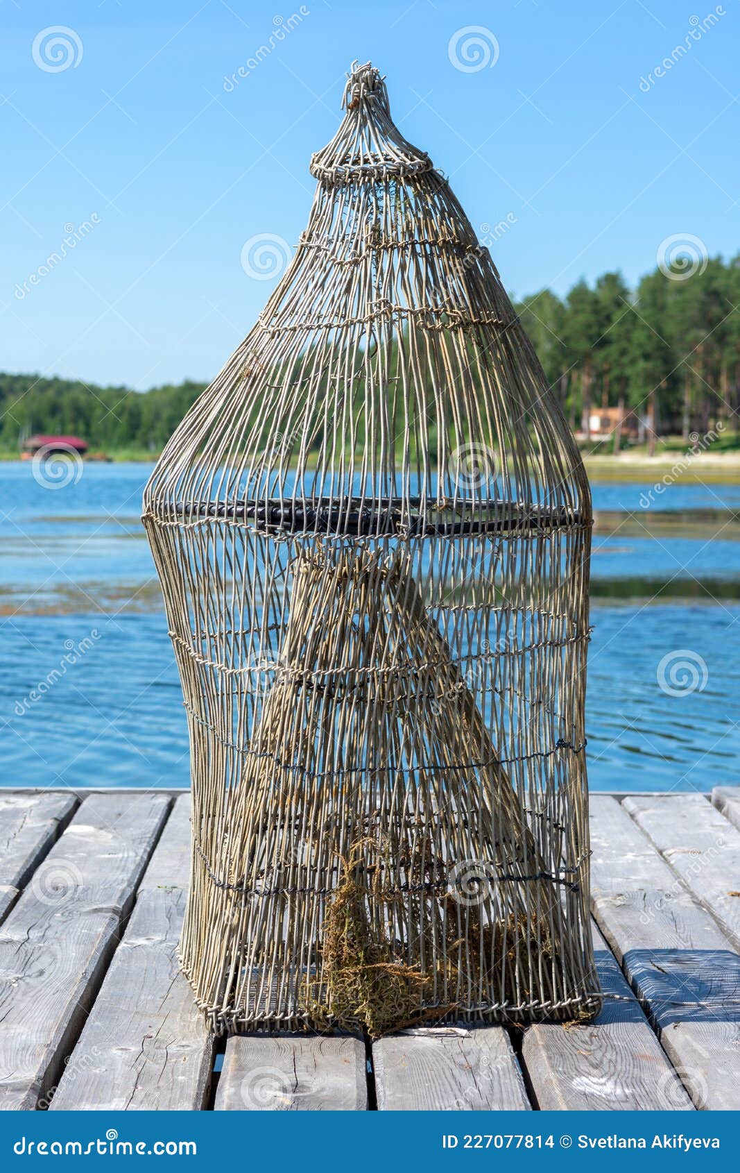 Fish Trap on a Wooden Pier on the Lake Shore Stock Photo - Image
