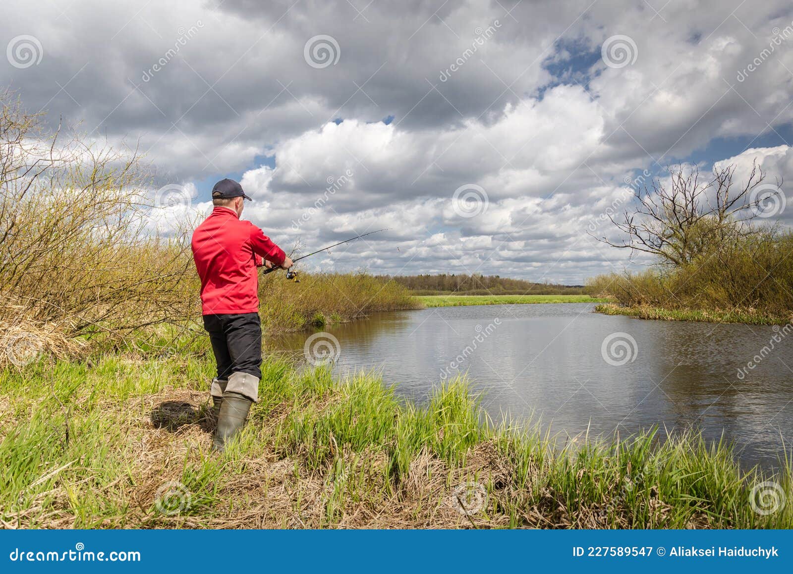 https://thumbs.dreamstime.com/z/fisher-fishing-rod-stands-river-bank-beautiful-landscape-fisher-fishing-rod-stands-river-bank-227589547.jpg