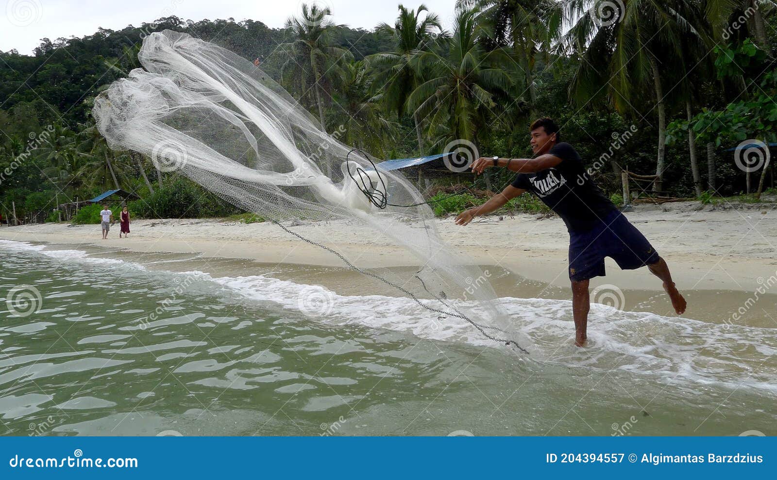 Fisher Man Throwing Fishing Net for Catching Fish for Food