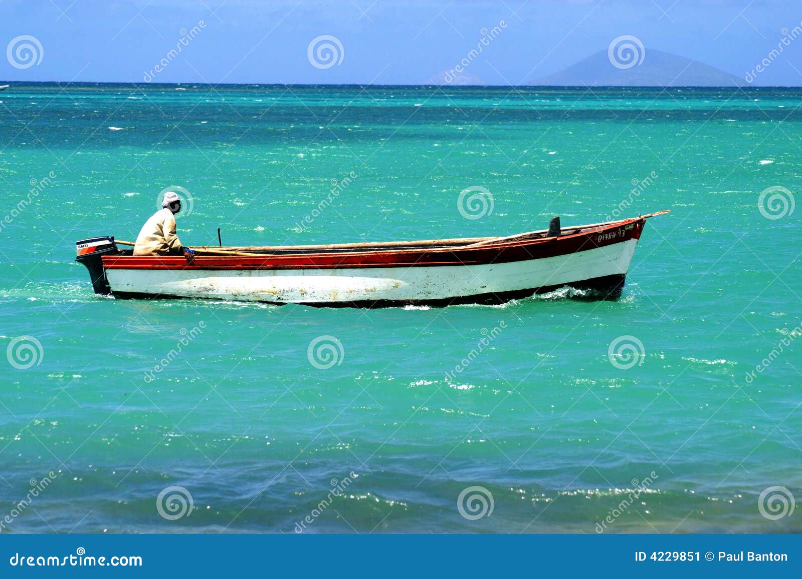 Fisherman In A Boat Stock Image Image 4229851