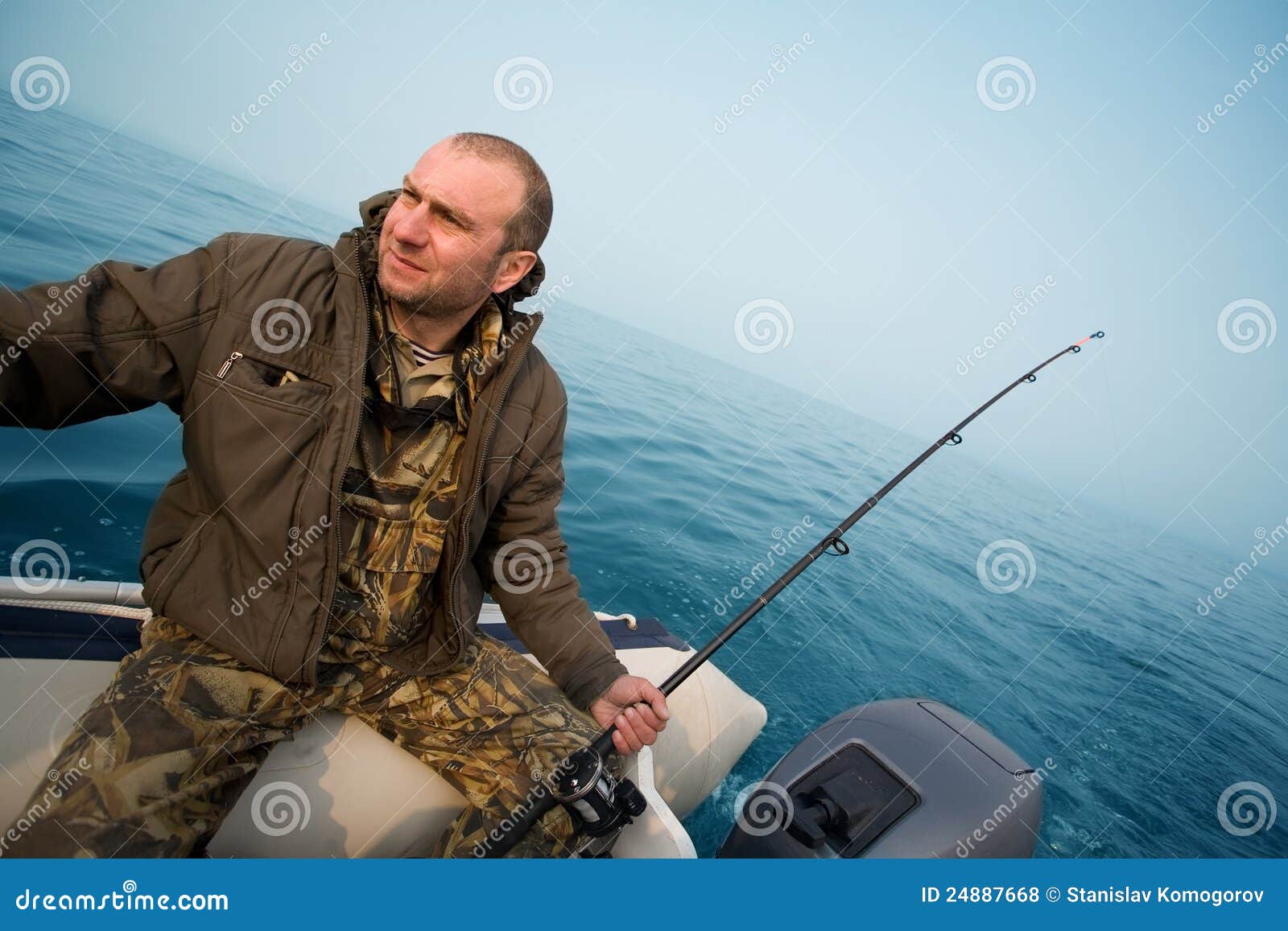 Fisherman Catches Salmon Trolling Stock Photo - Image of holiday, fishing:  24887668