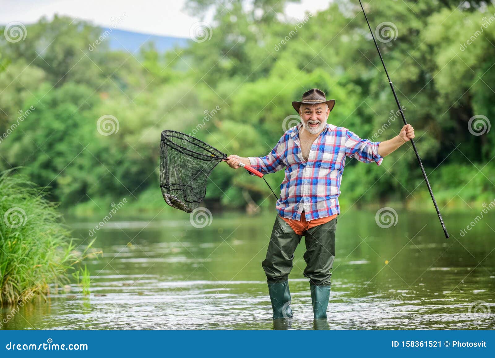 Fisherman with Fishing Rod. Activity and Hobby. Fishing Freshwater
