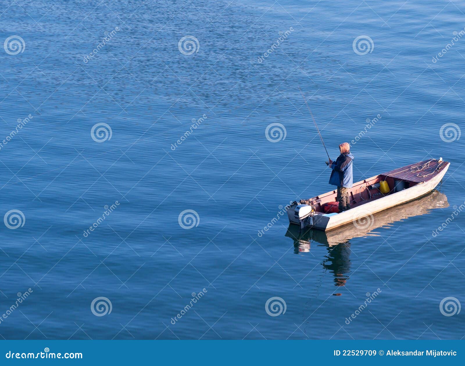 Fisherman Fishing In The Sea Royalty Free Stock Images 