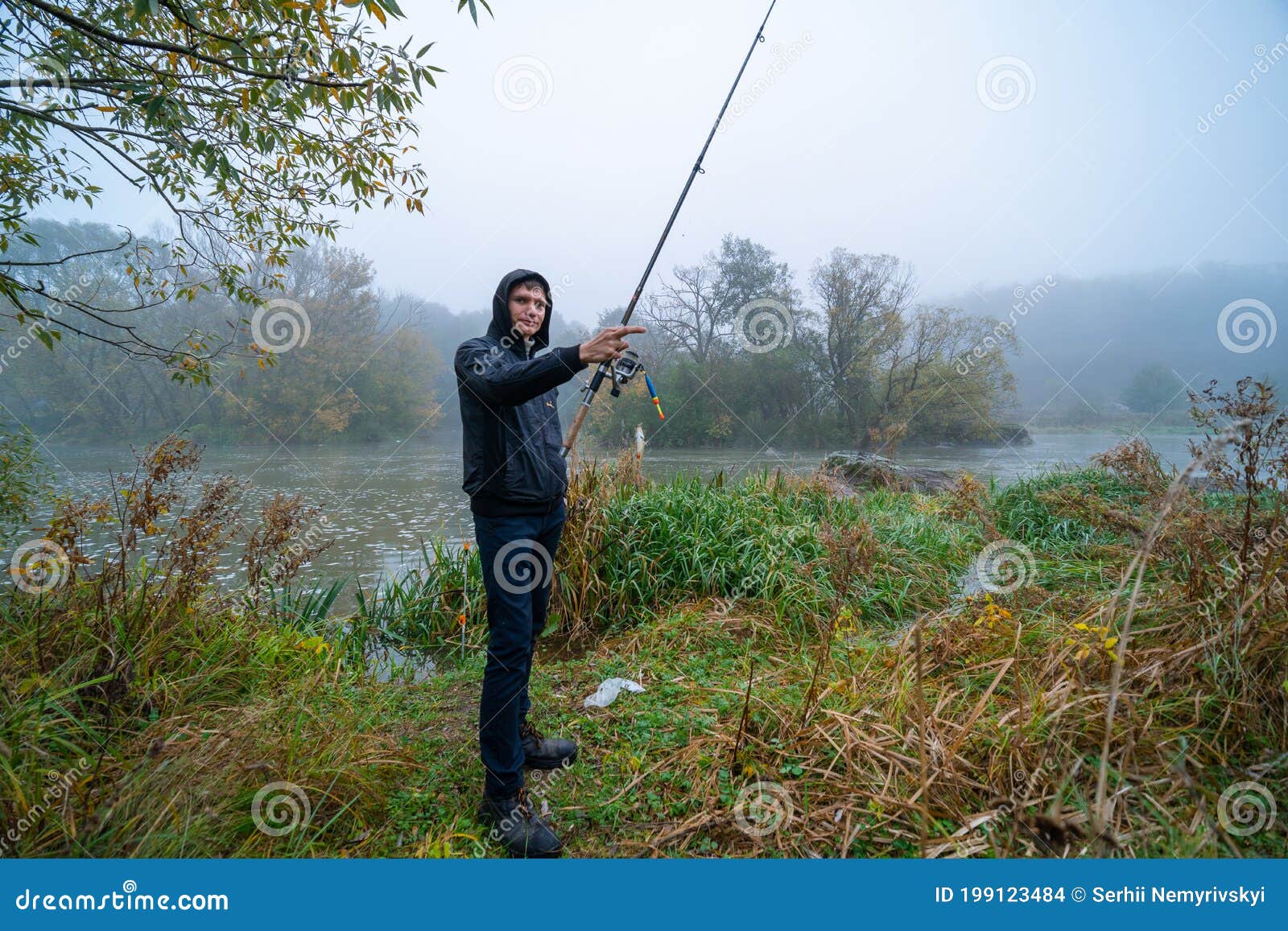 The Fisherman and His Catch. Small Fish with Red Fins, Line and