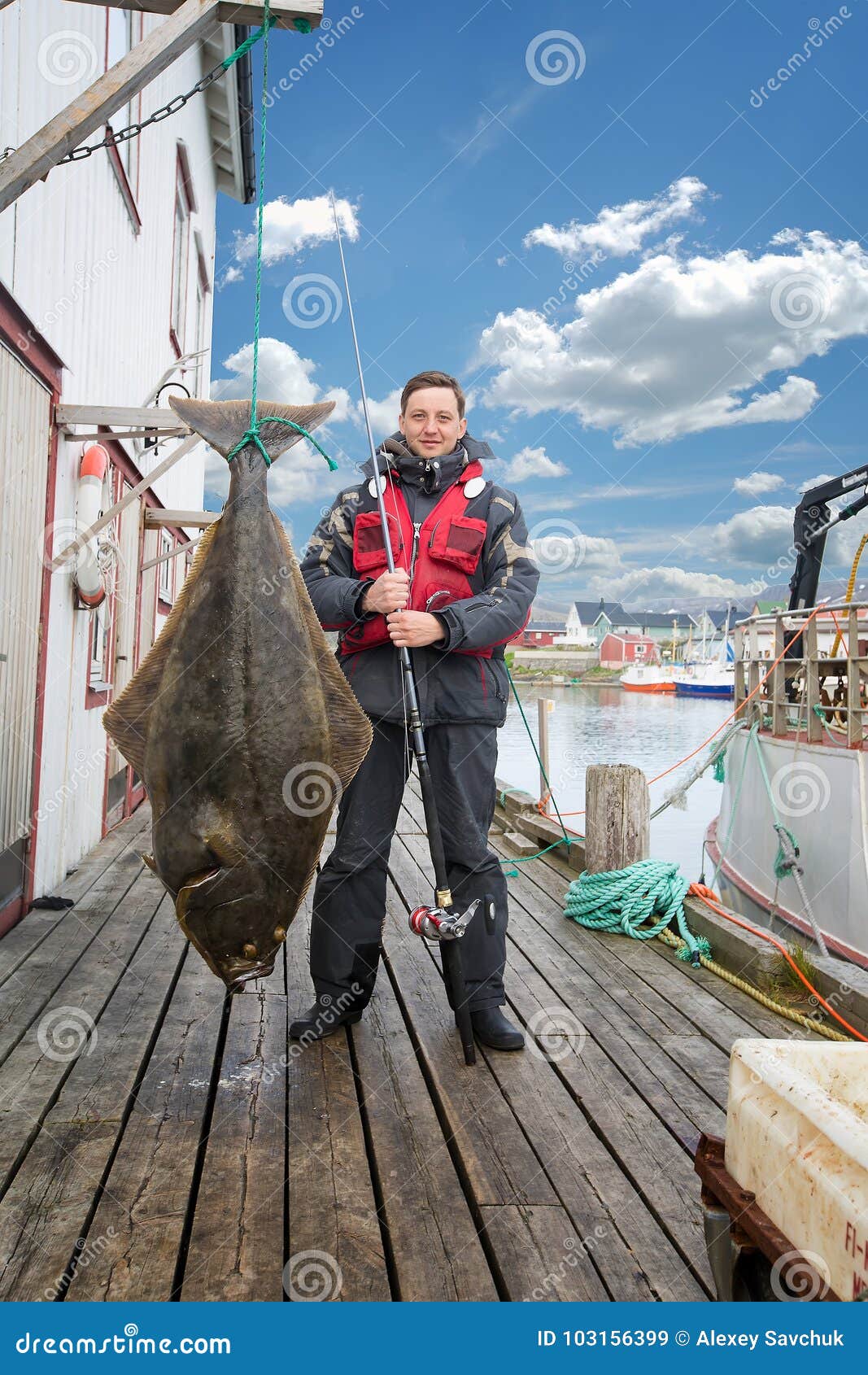 Fisherman on the Pier with a Big Fish. Halibut Stock Image Image of