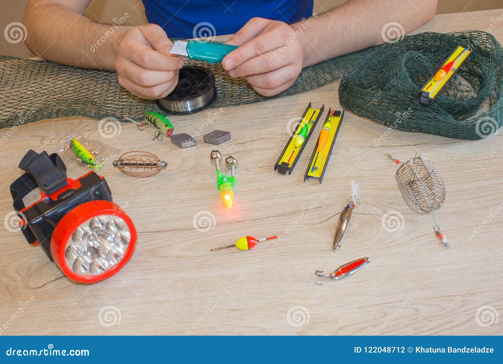 Fisherman Prepare To Fishing. Tools and Accessories on Wooden Table Stock  Photo - Image of colorful, accessories: 122048712