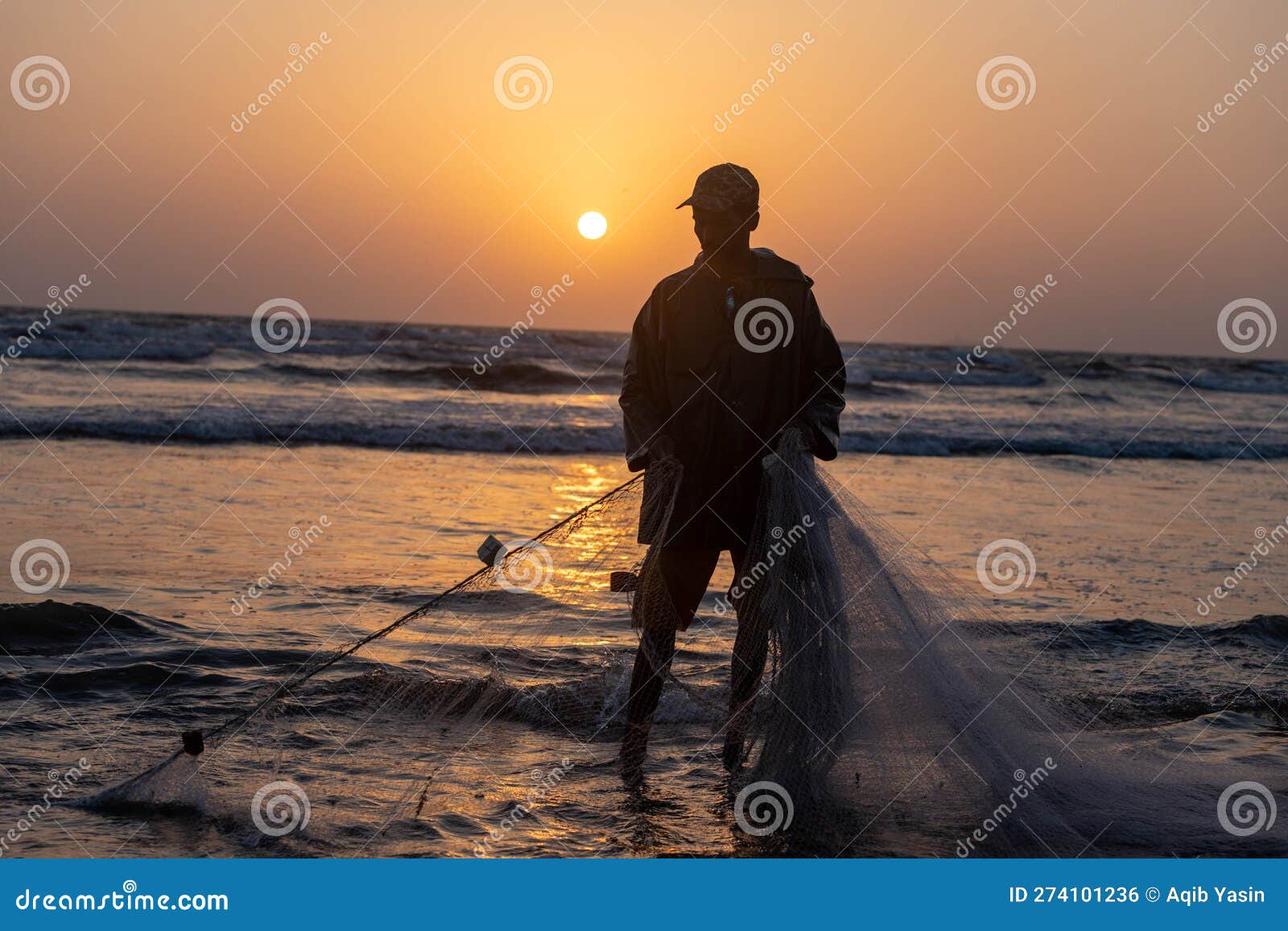 A Fisherman Preparing Fishing Net for Fishing Editorial Photo