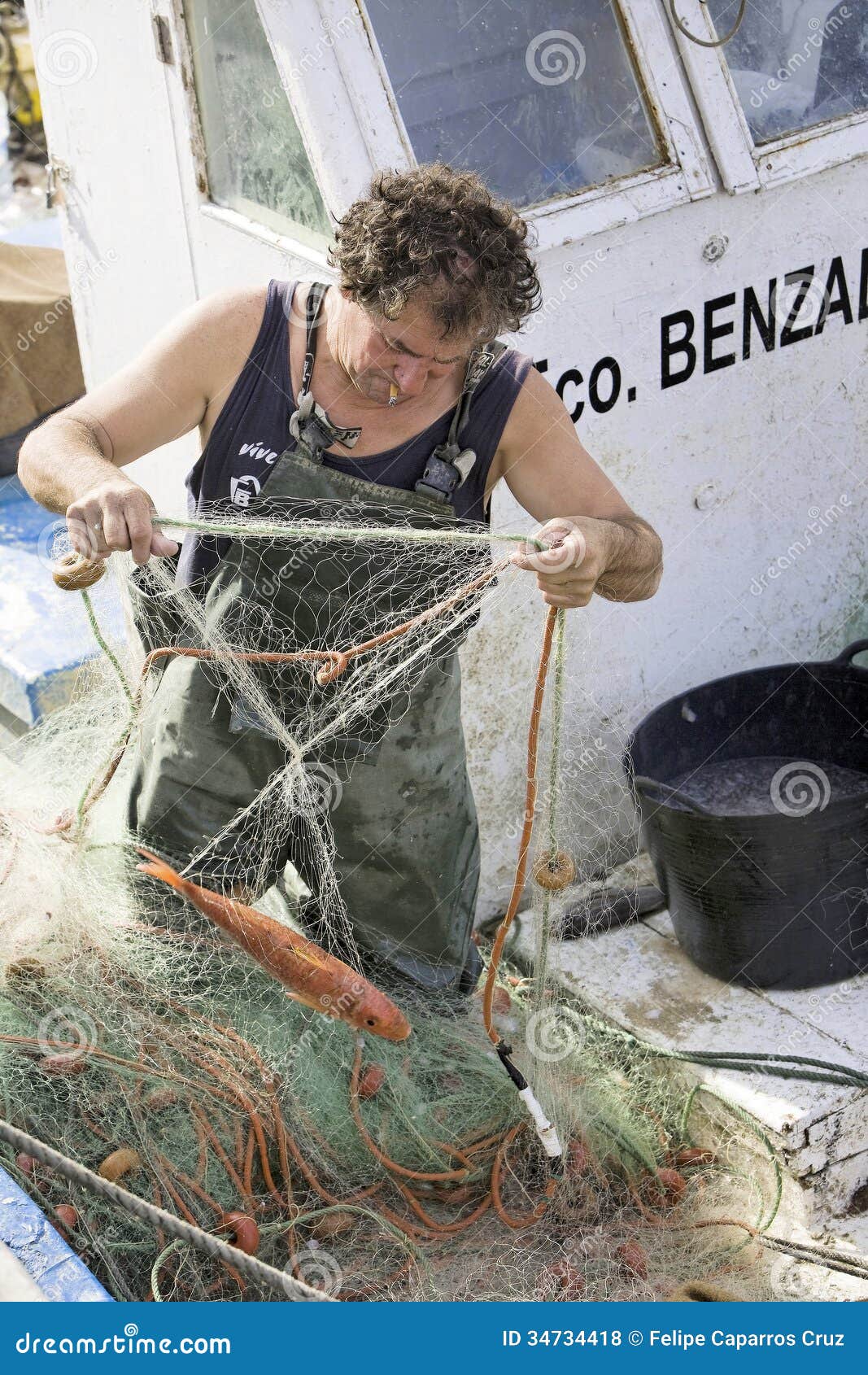 Fisherman Removing Fish Nets Editorial Image 34734418
