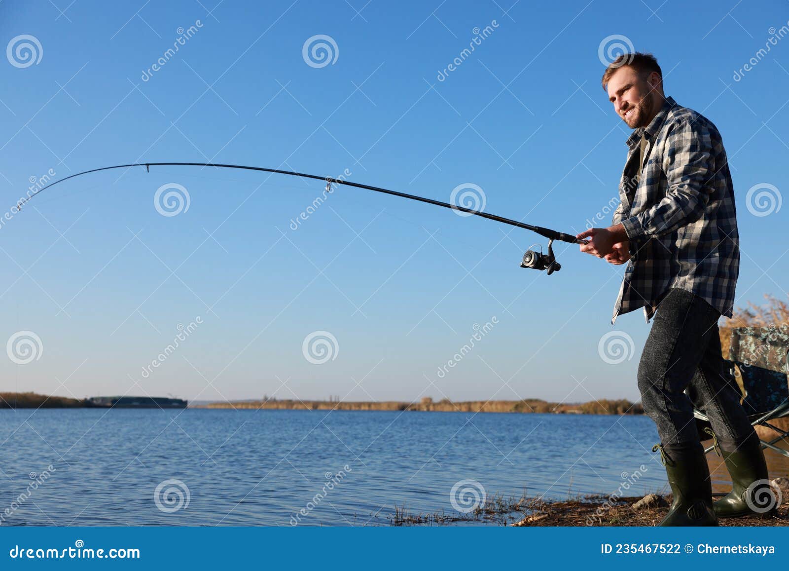 Fisherman with Rod Fishing at Riverside. Recreational Activity Stock Photo  - Image of hobby, fishing: 235467522