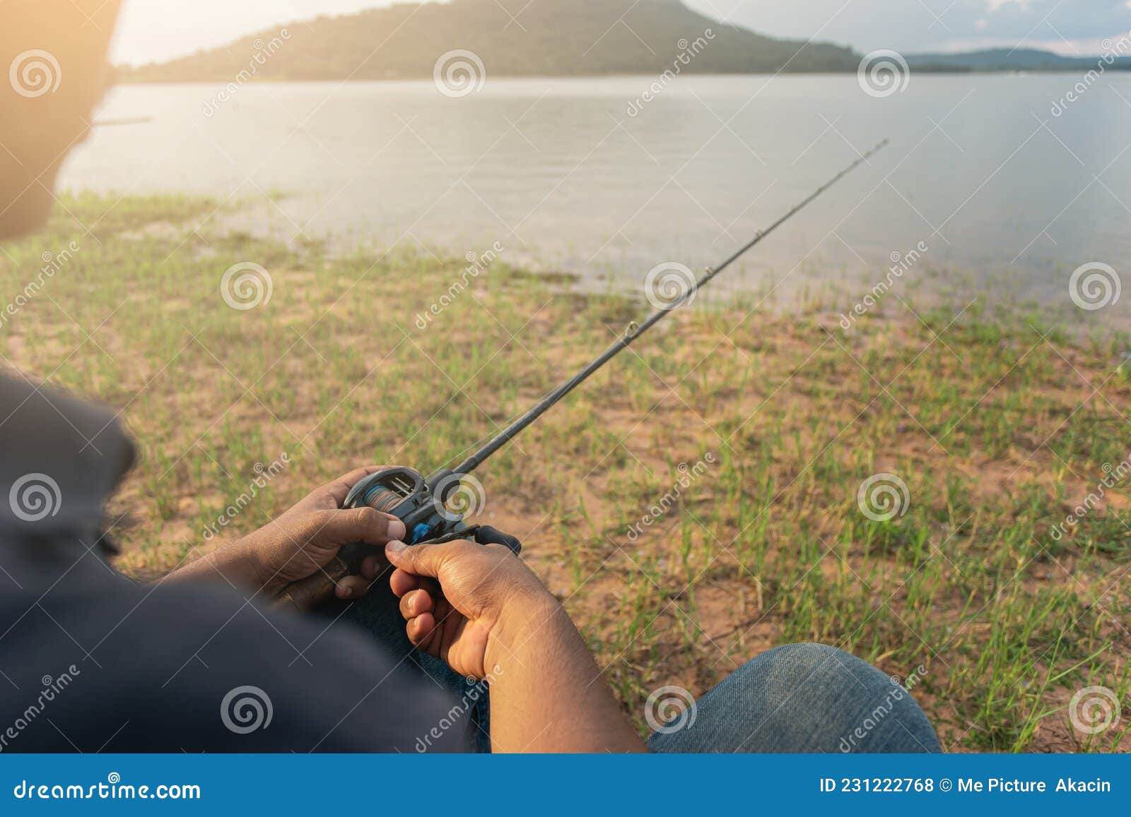 Angler with Fishing Rod in Hands Stock Photo - Image of sitting