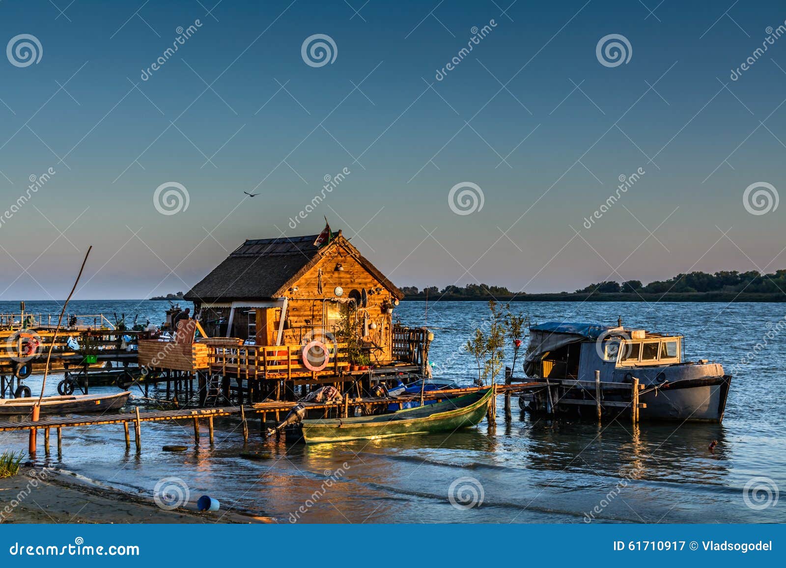 Fisherman's House, The Old Dock And The Boat On The Lake ...