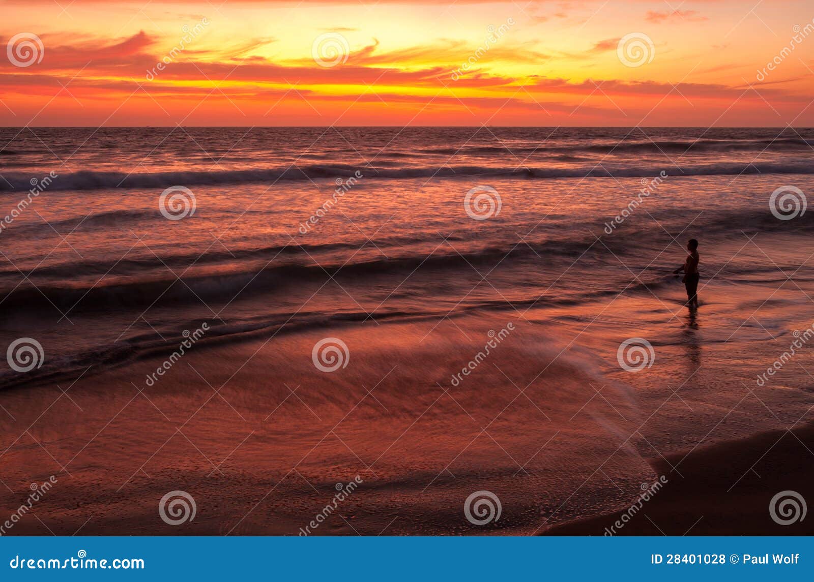 fisherman at sunset near playas, ecuador