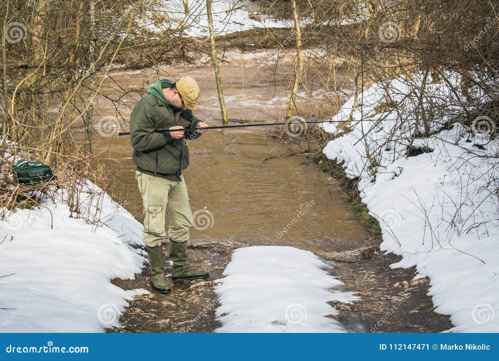 Fisherman Try To Catch Fish In The River. Stock Image - Image of catch, bite: 112147471