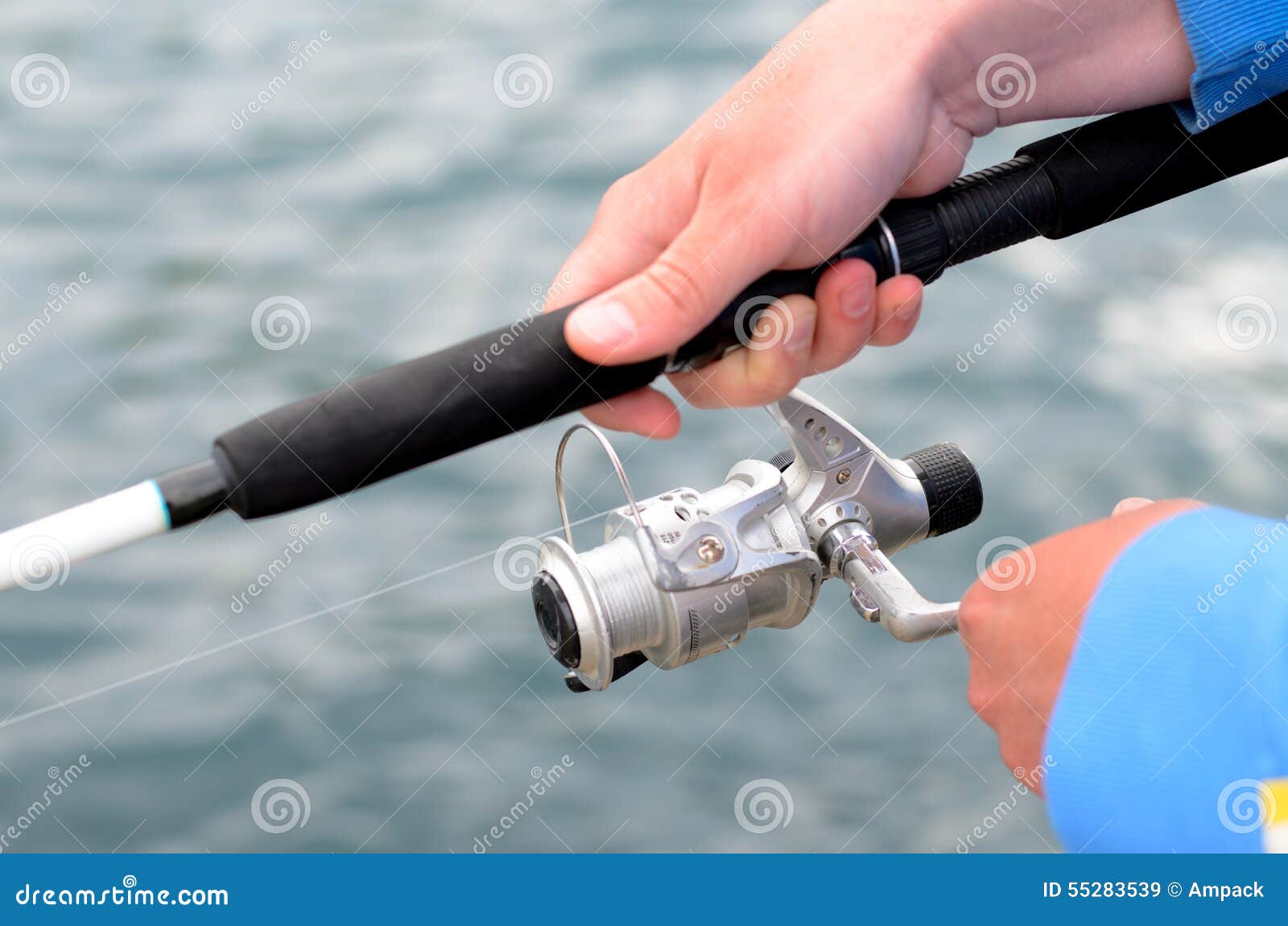 Fisherman Using a Rod and Spinner Reel Stock Image Image of closeup