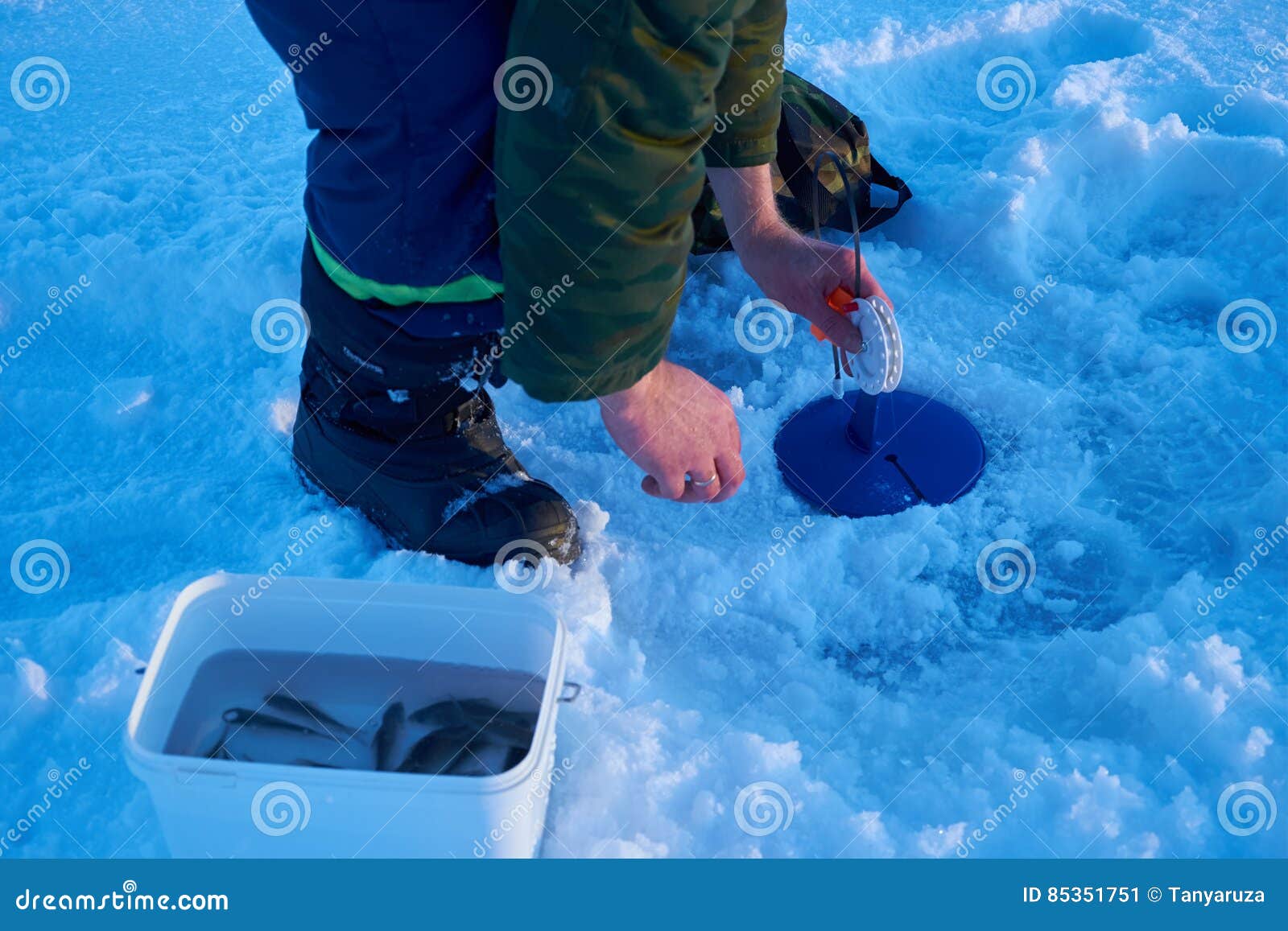 Fishermen Engaged in Ice Fishing Stock Image Image of lake, frozen